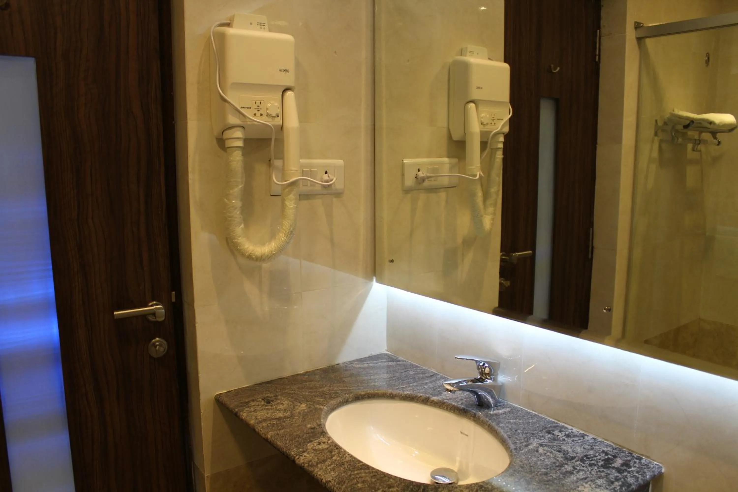Bathroom in Maple Suites