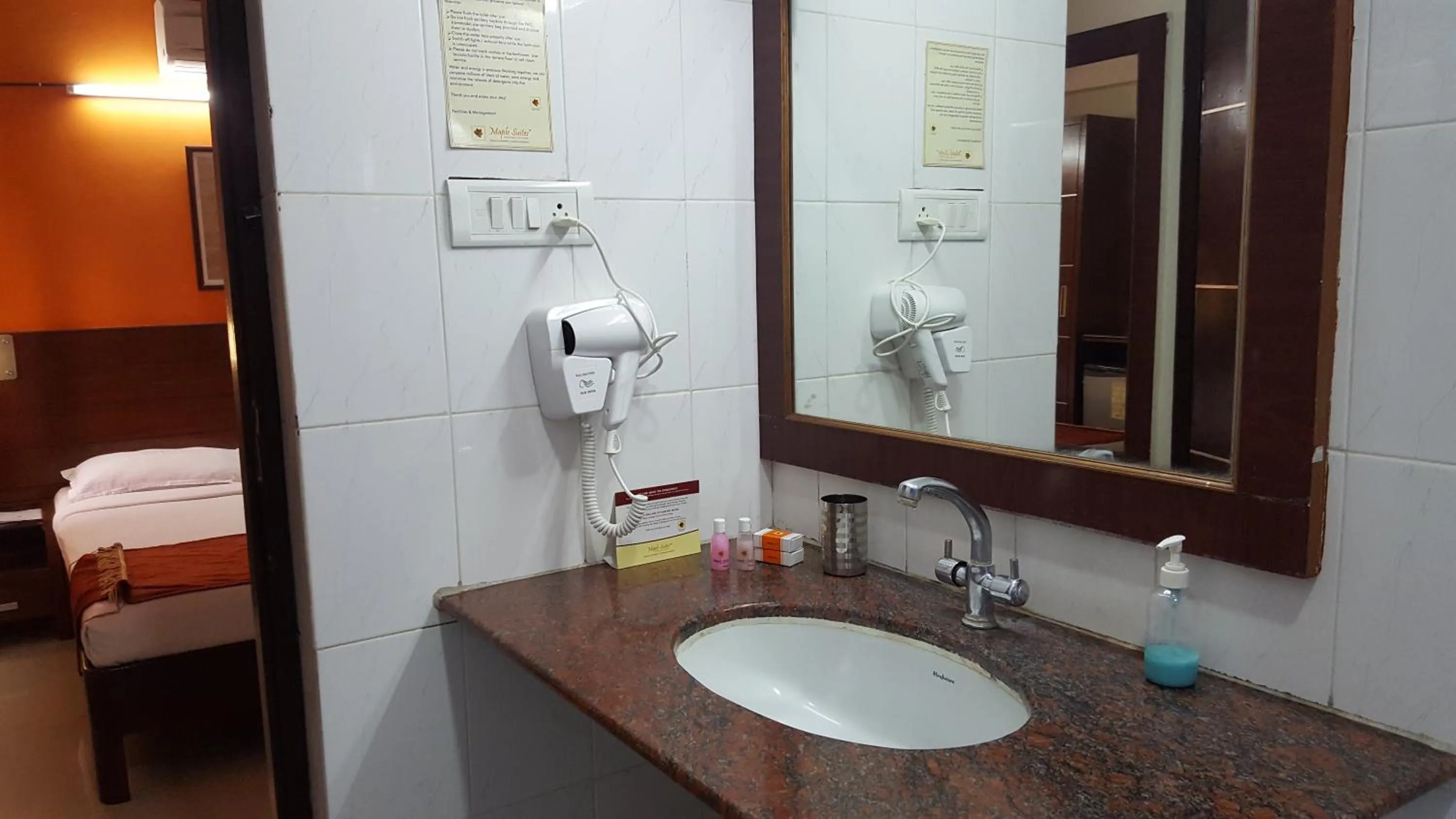 Bathroom in Maple Suites