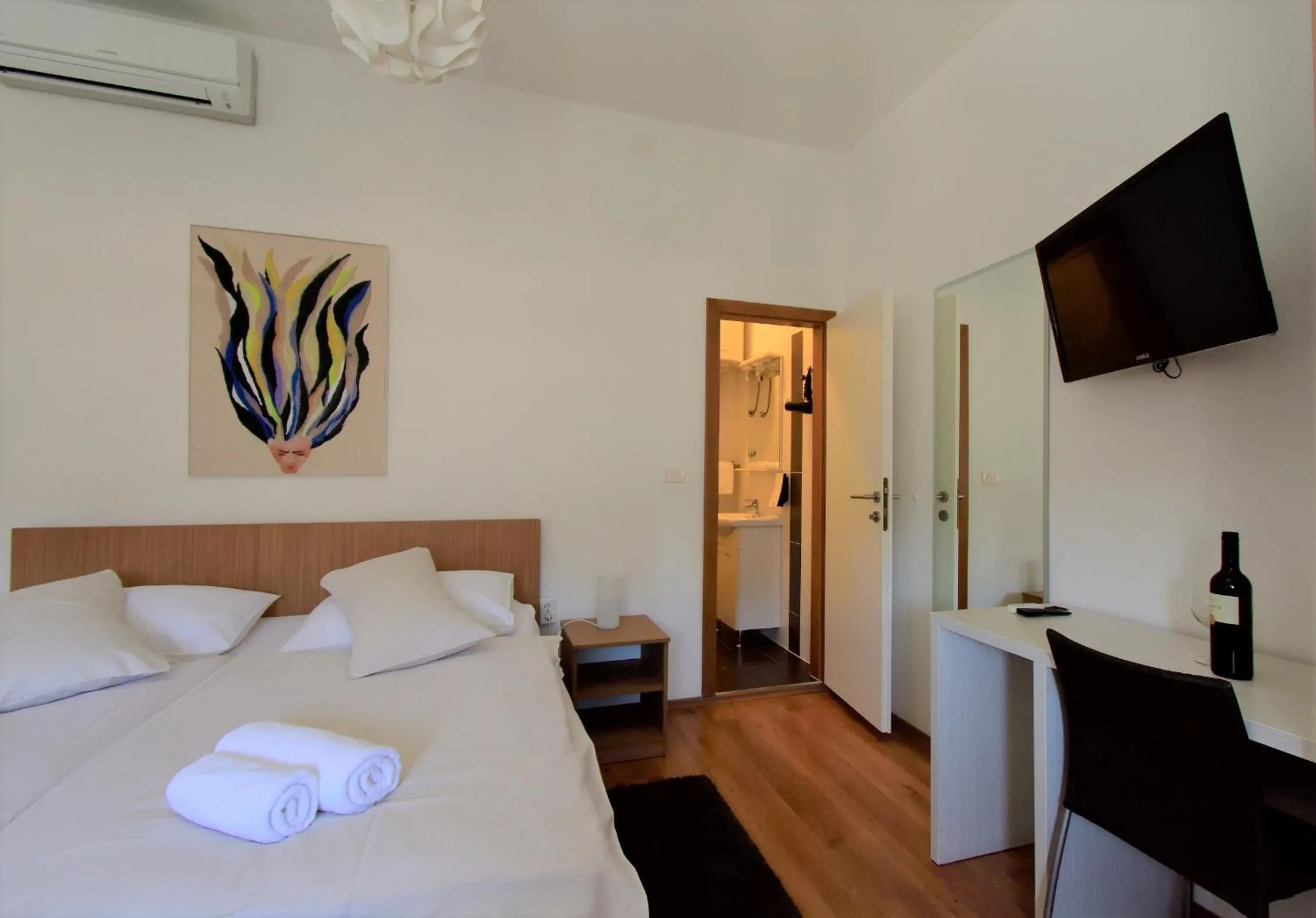 Bed in Marmontova Luxury Rooms