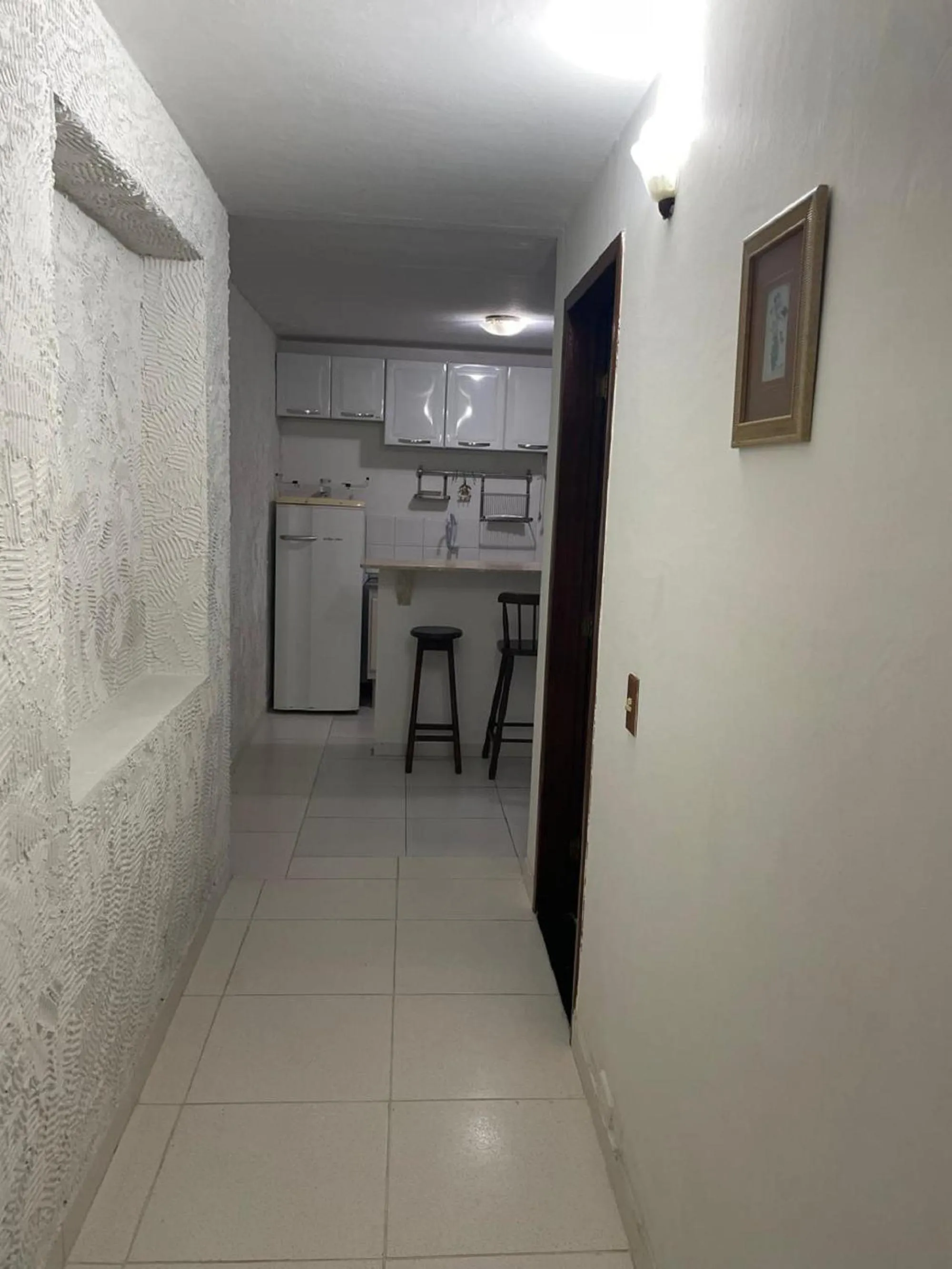 Kitchen or kitchenette in Pousada Saint Germain