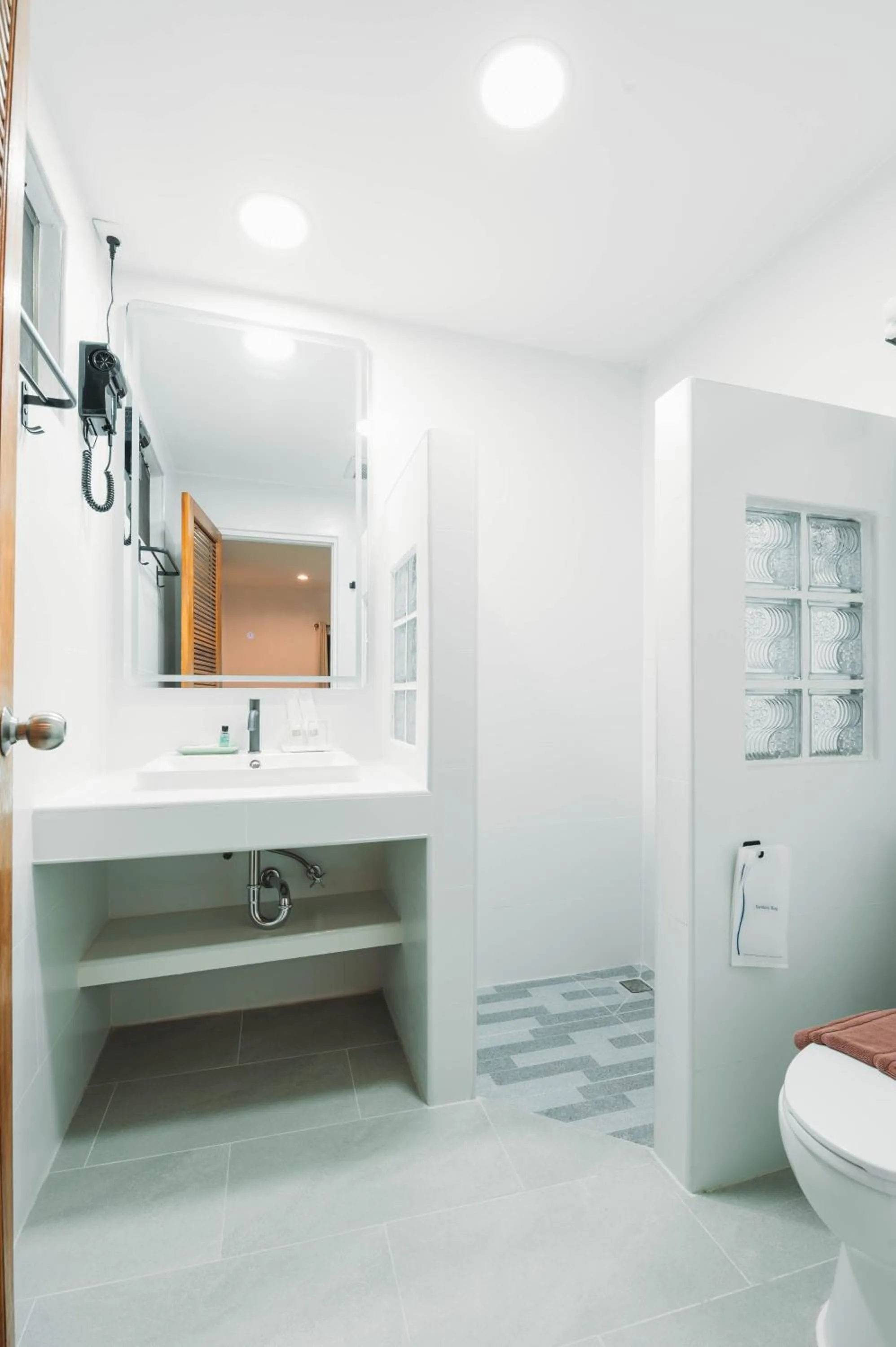 Toilet in Dolphin Bay Beach Resort