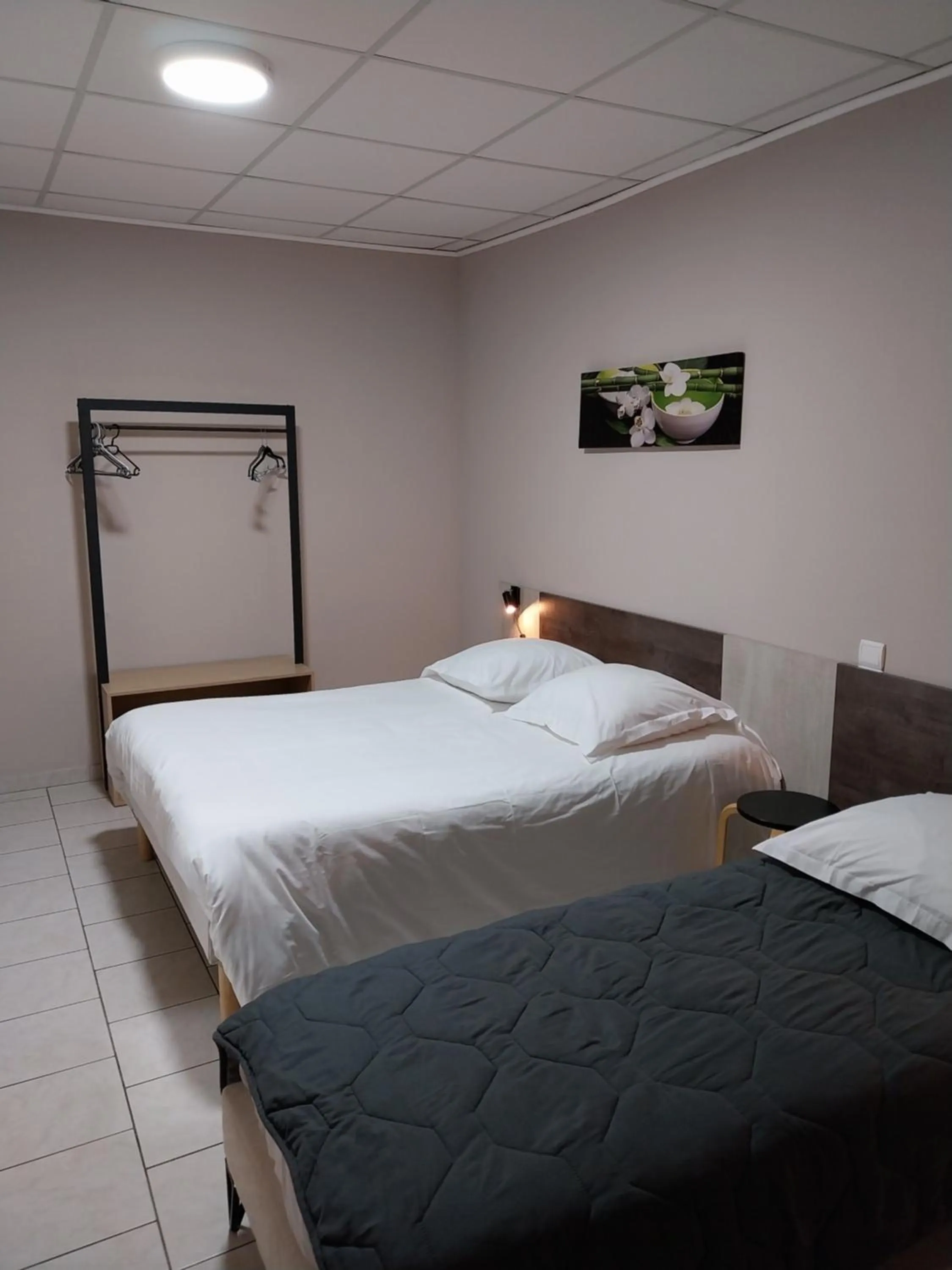 Bedroom, Bed in Le Petit Logis