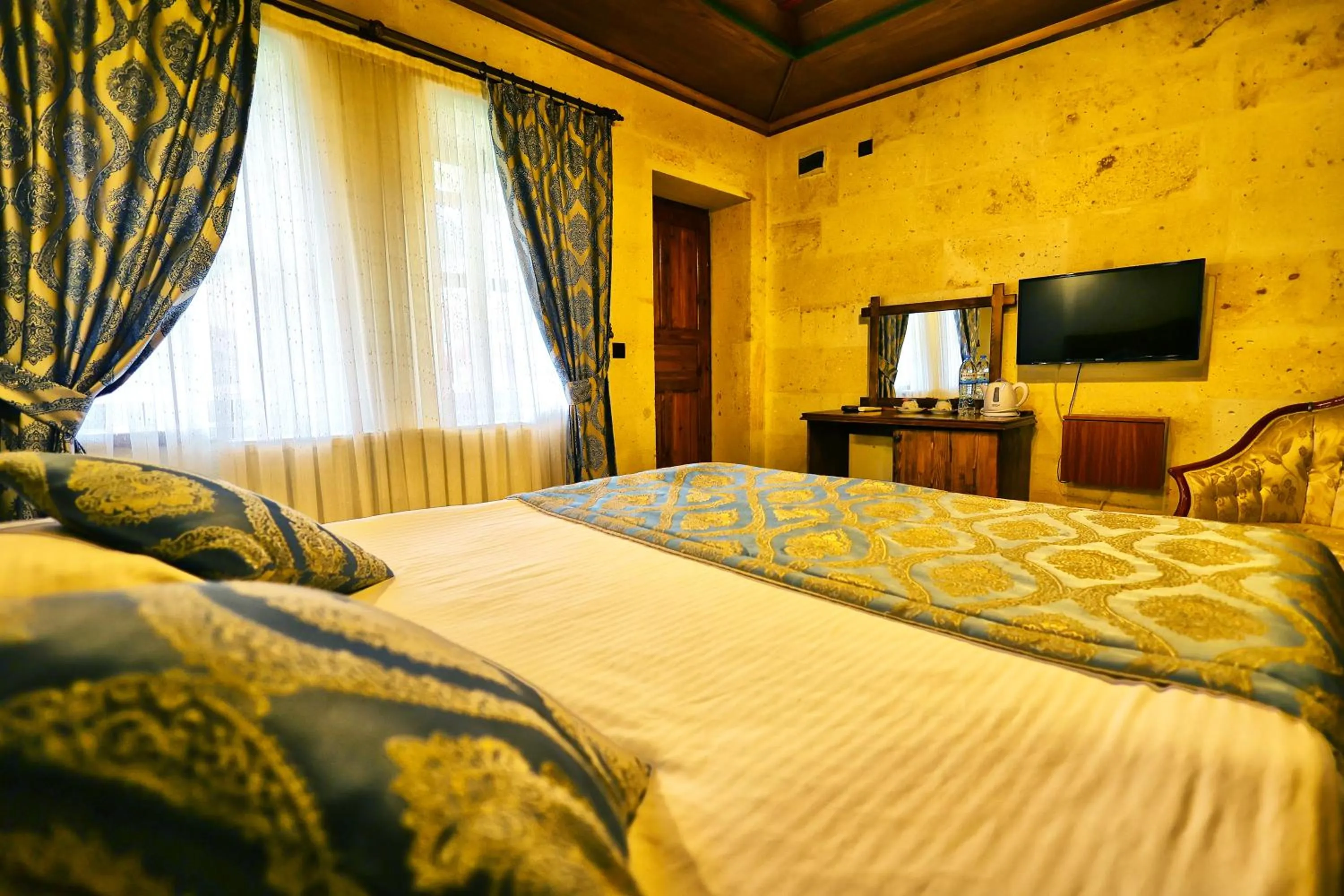 Bed in Cappadocia Empire Cave Hotel