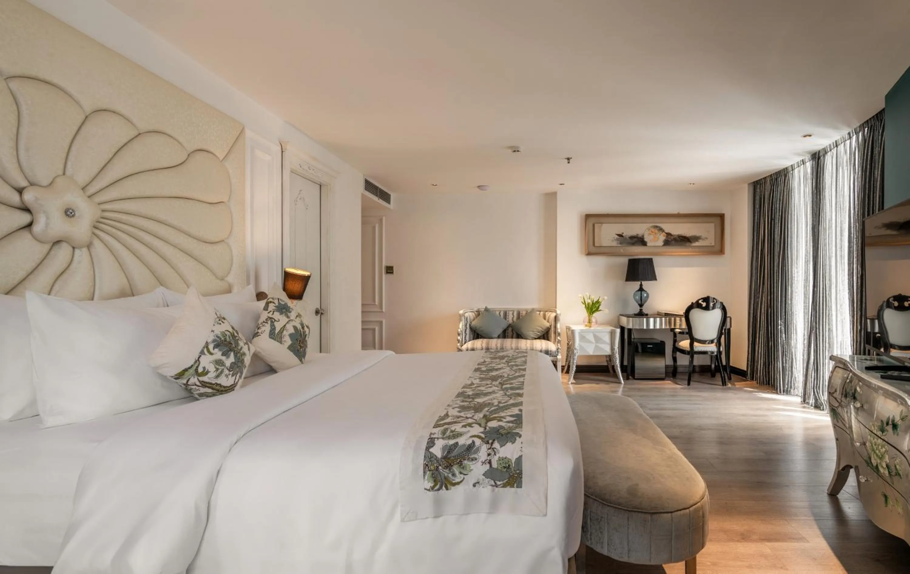 Bed in A&EM Saigon Hotel