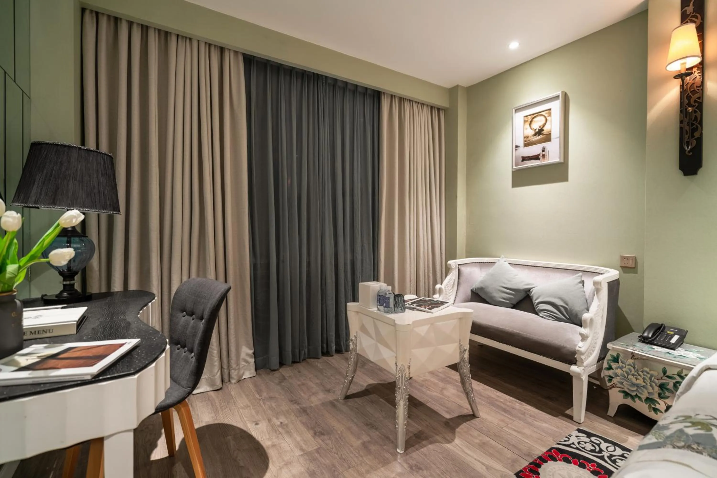 Seating area, Bed in A&EM Saigon Hotel