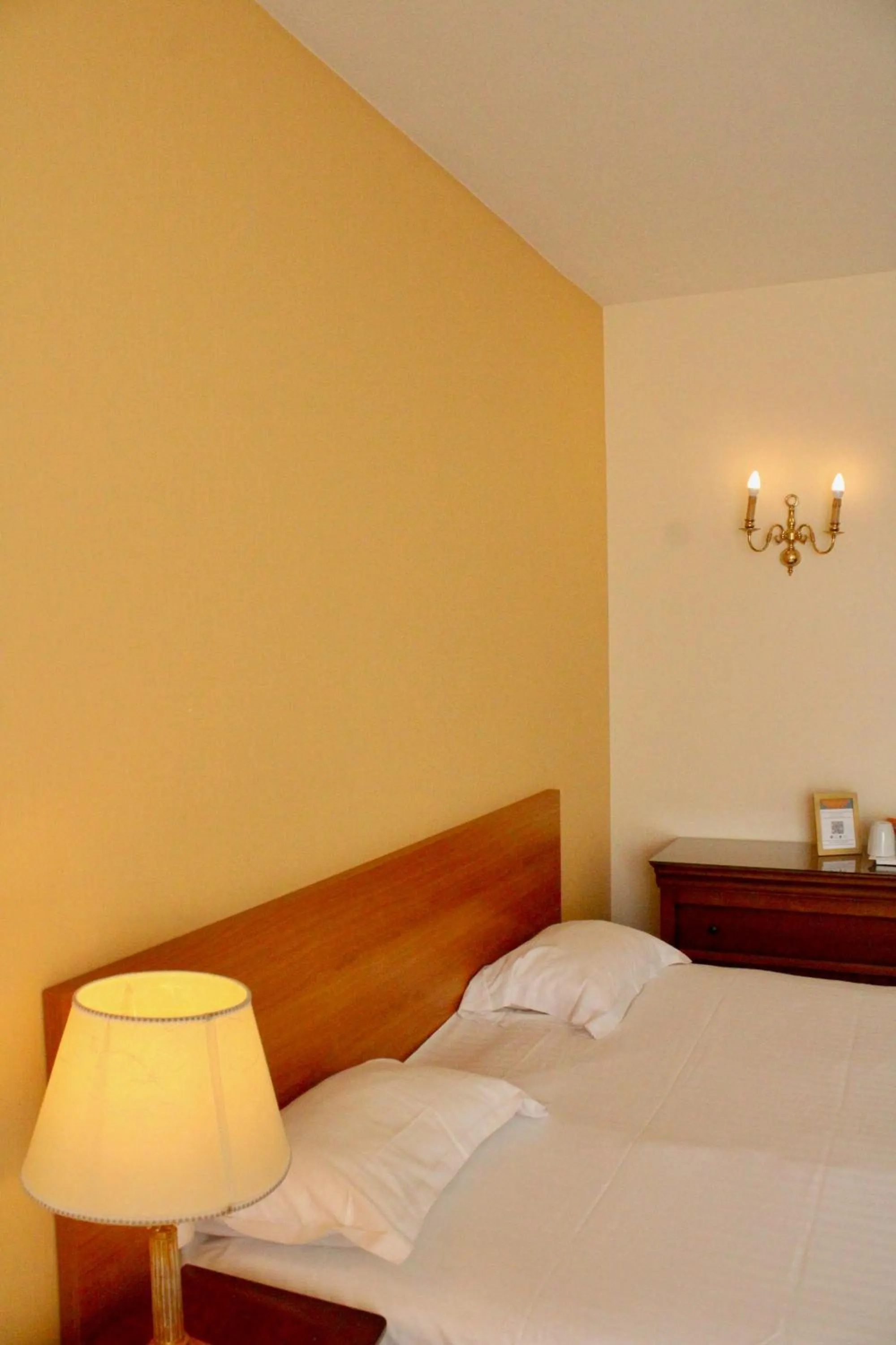 Bed in Hôtel de la Marine