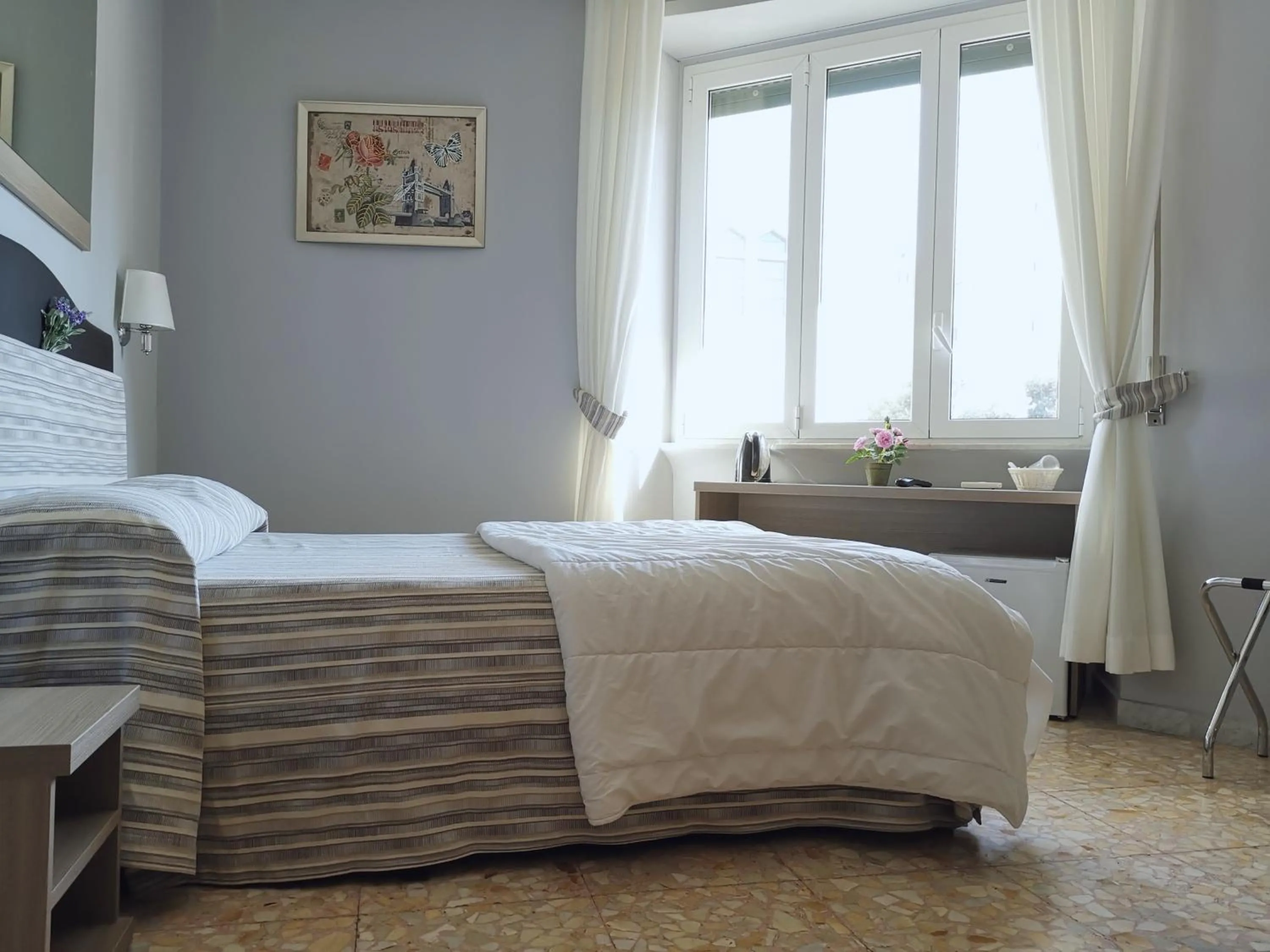 Bed in St. Anthony Guest House