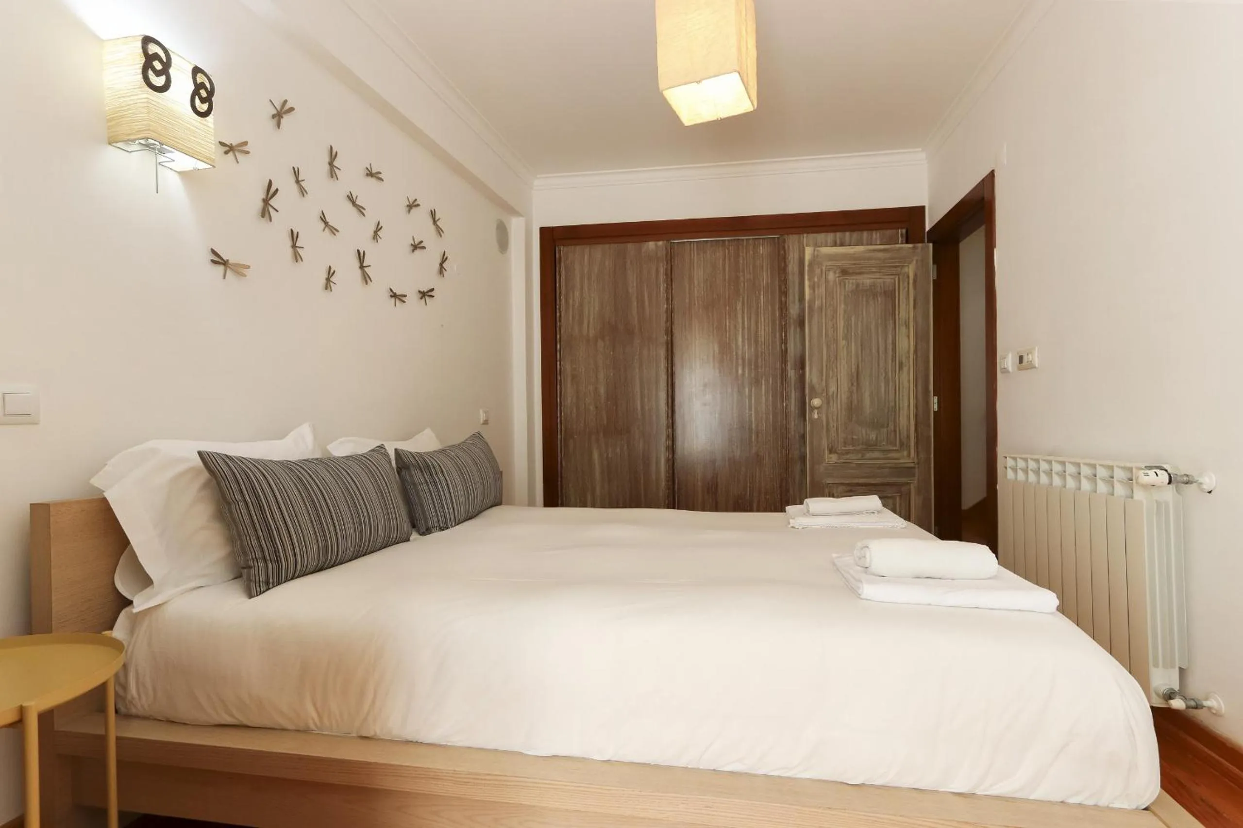 Bed in Grand Parliament Duplex by Homing