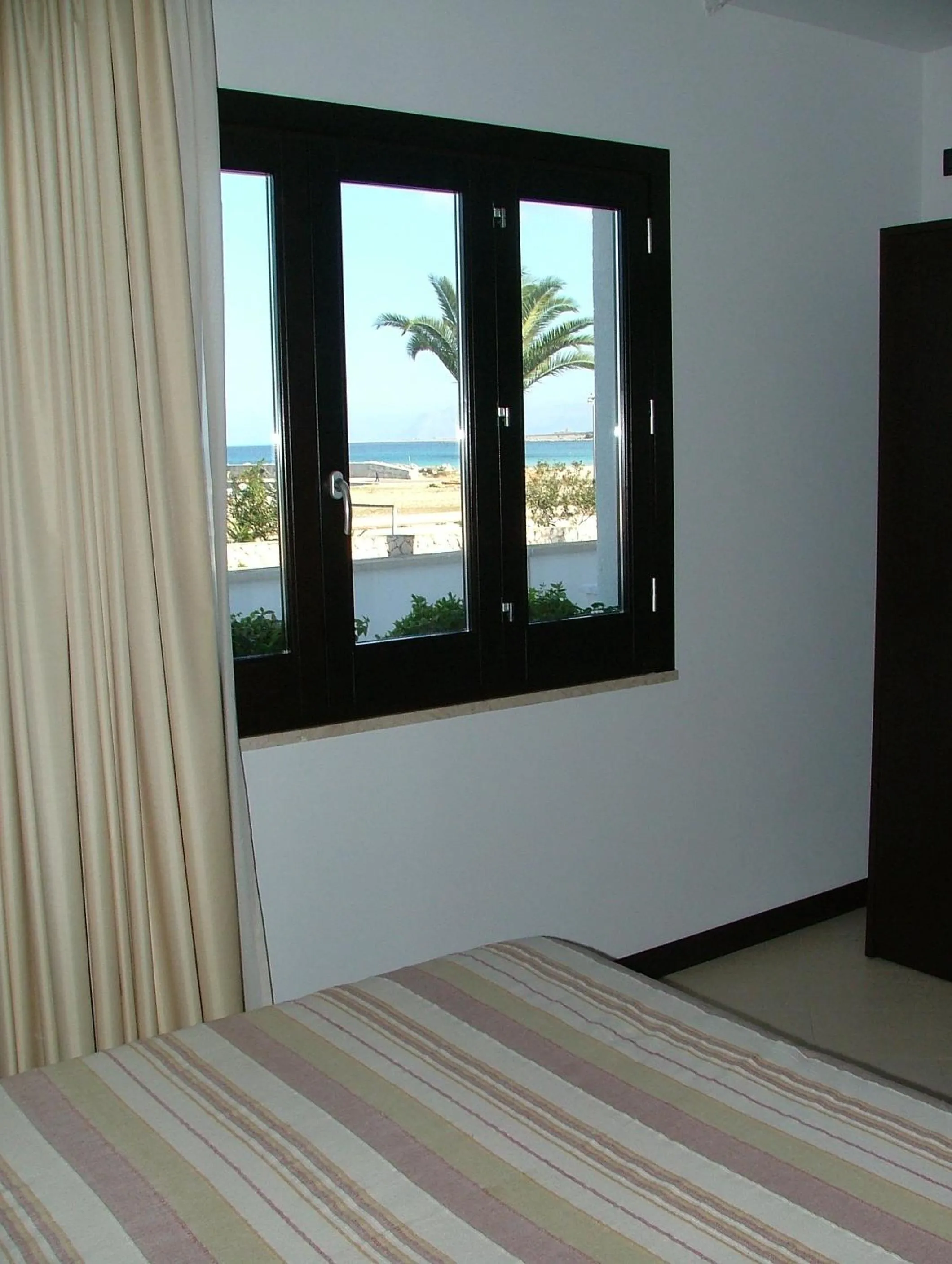 Bedroom in Villa Faro B&B