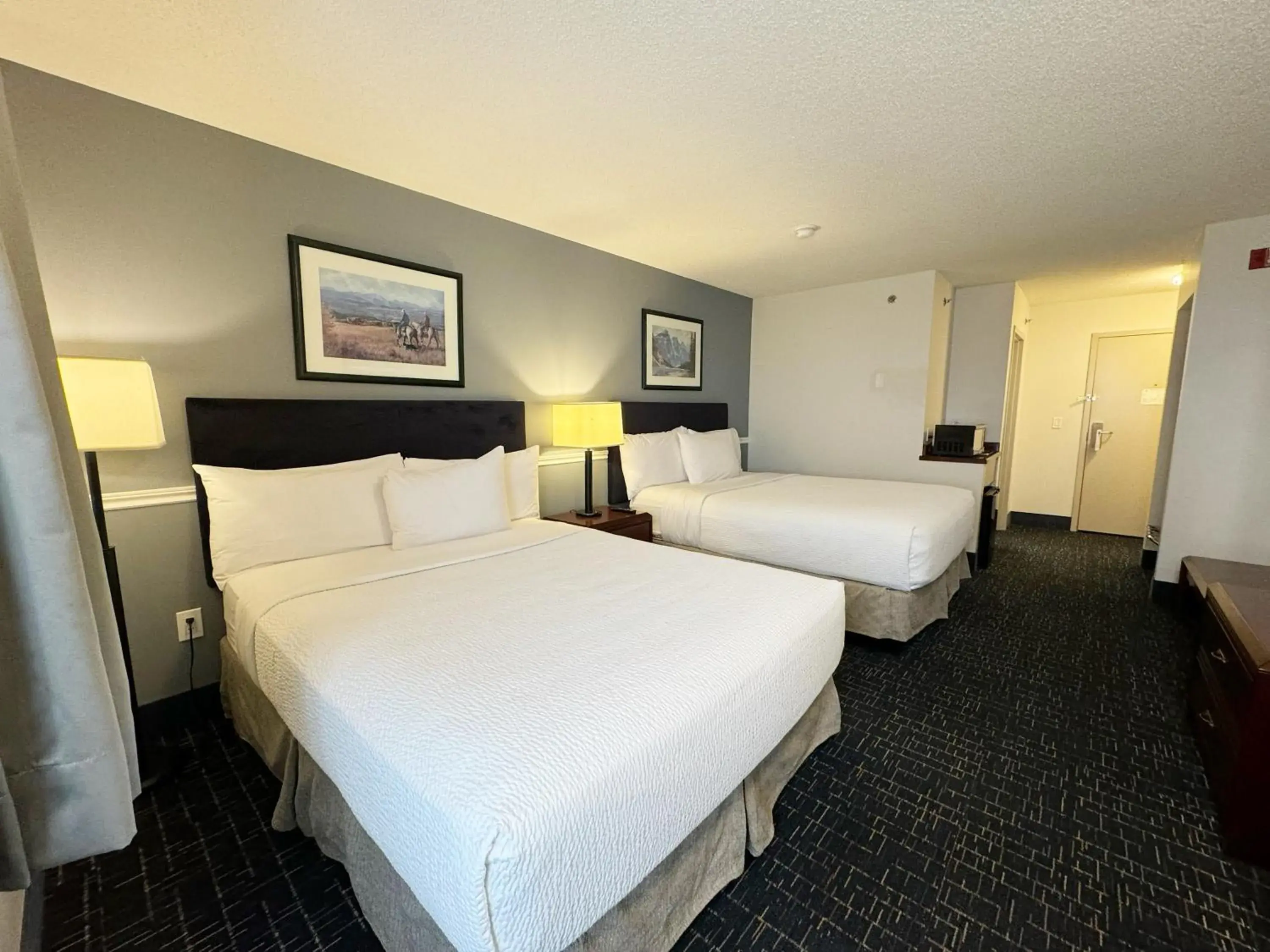 Bed in Divya Sutra Plaza and Conference Centre Calgary Airport Bed in Divya Sutra Plaza and Conference Centre Calgary Airport