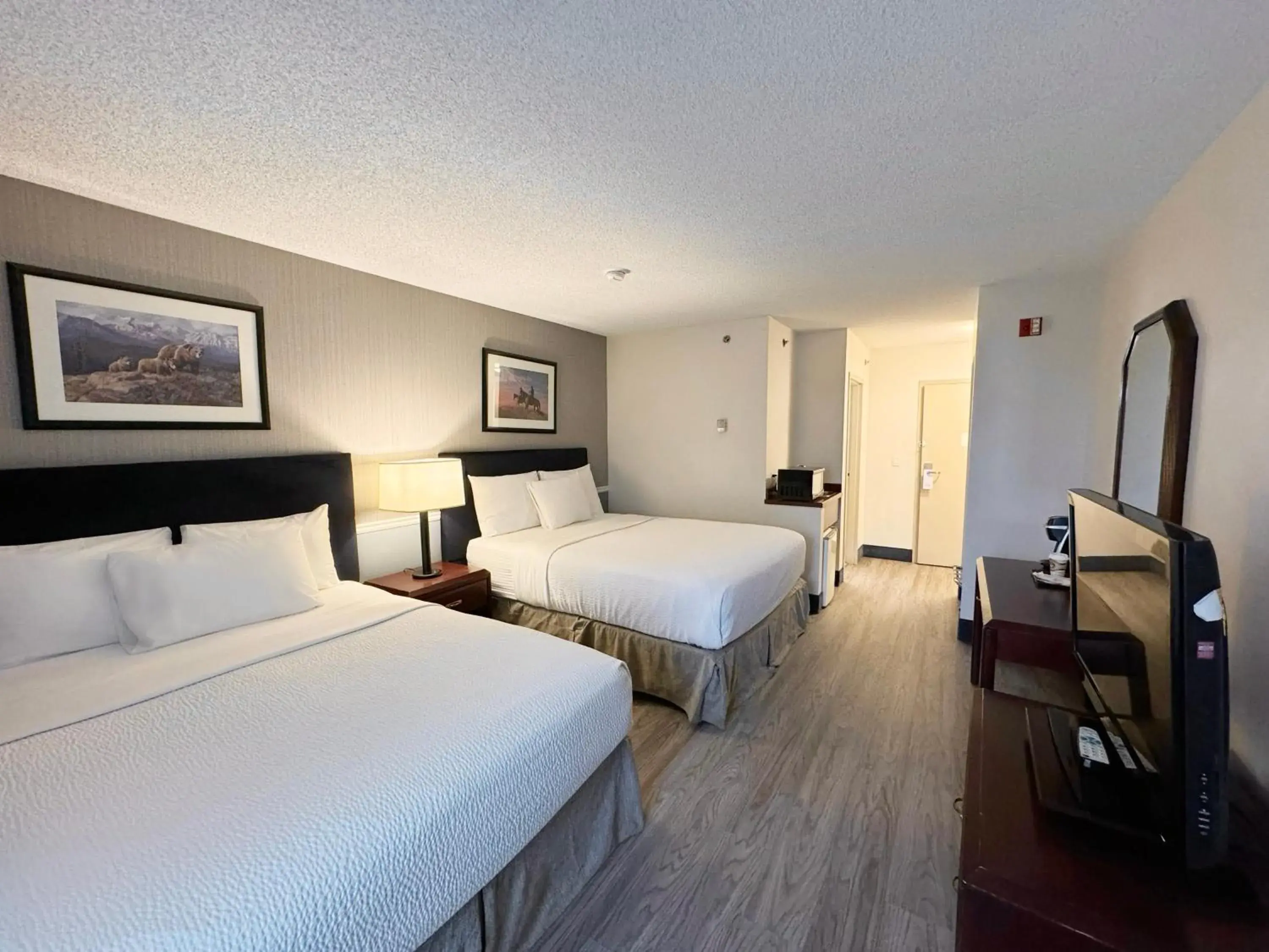 Bed in Divya Sutra Plaza and Conference Centre Calgary Airport Bed in Divya Sutra Plaza and Conference Centre Calgary Airport
