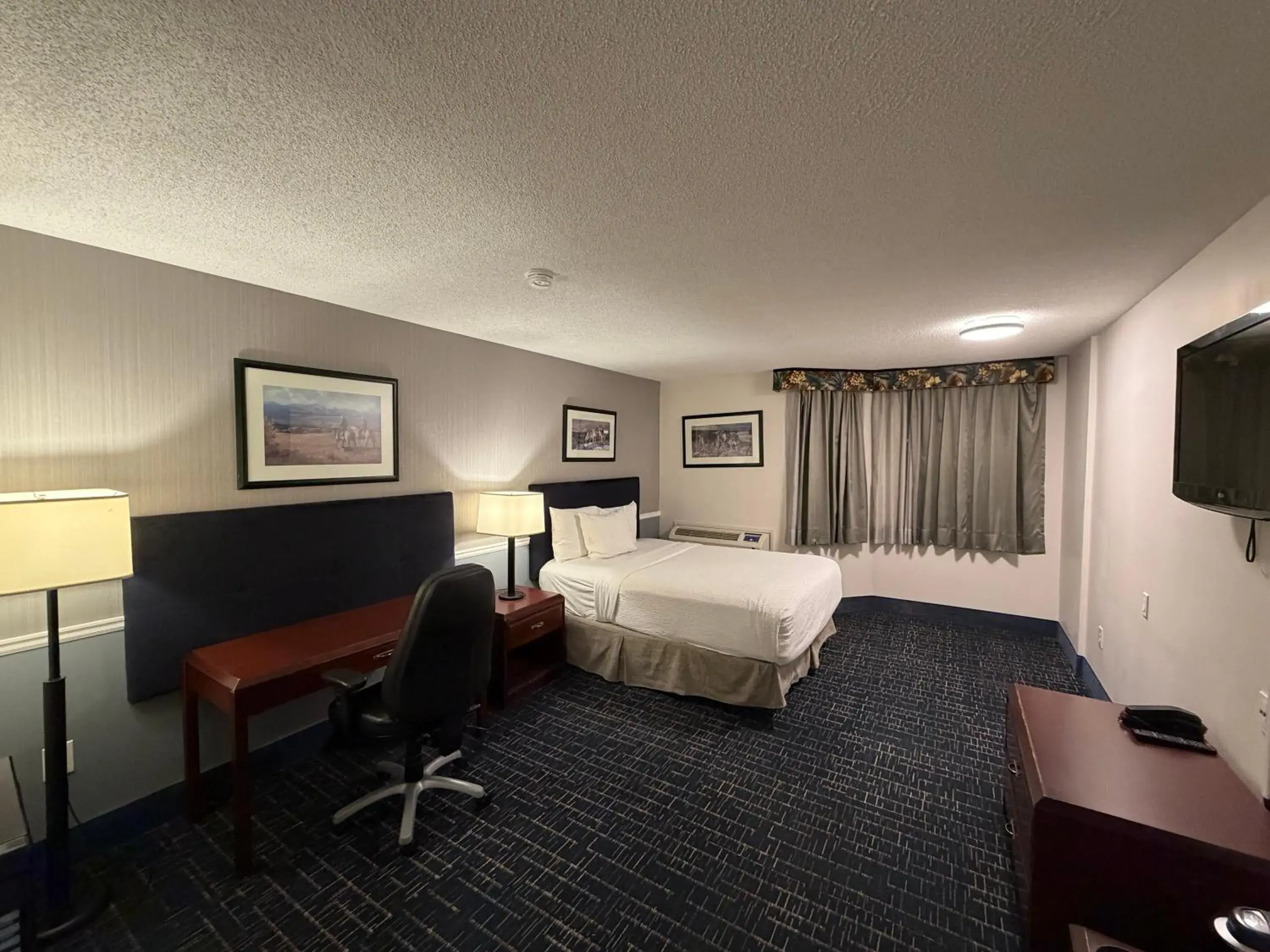 Bed in Divya Sutra Plaza and Conference Centre Calgary Airport Bed in Divya Sutra Plaza and Conference Centre Calgary Airport