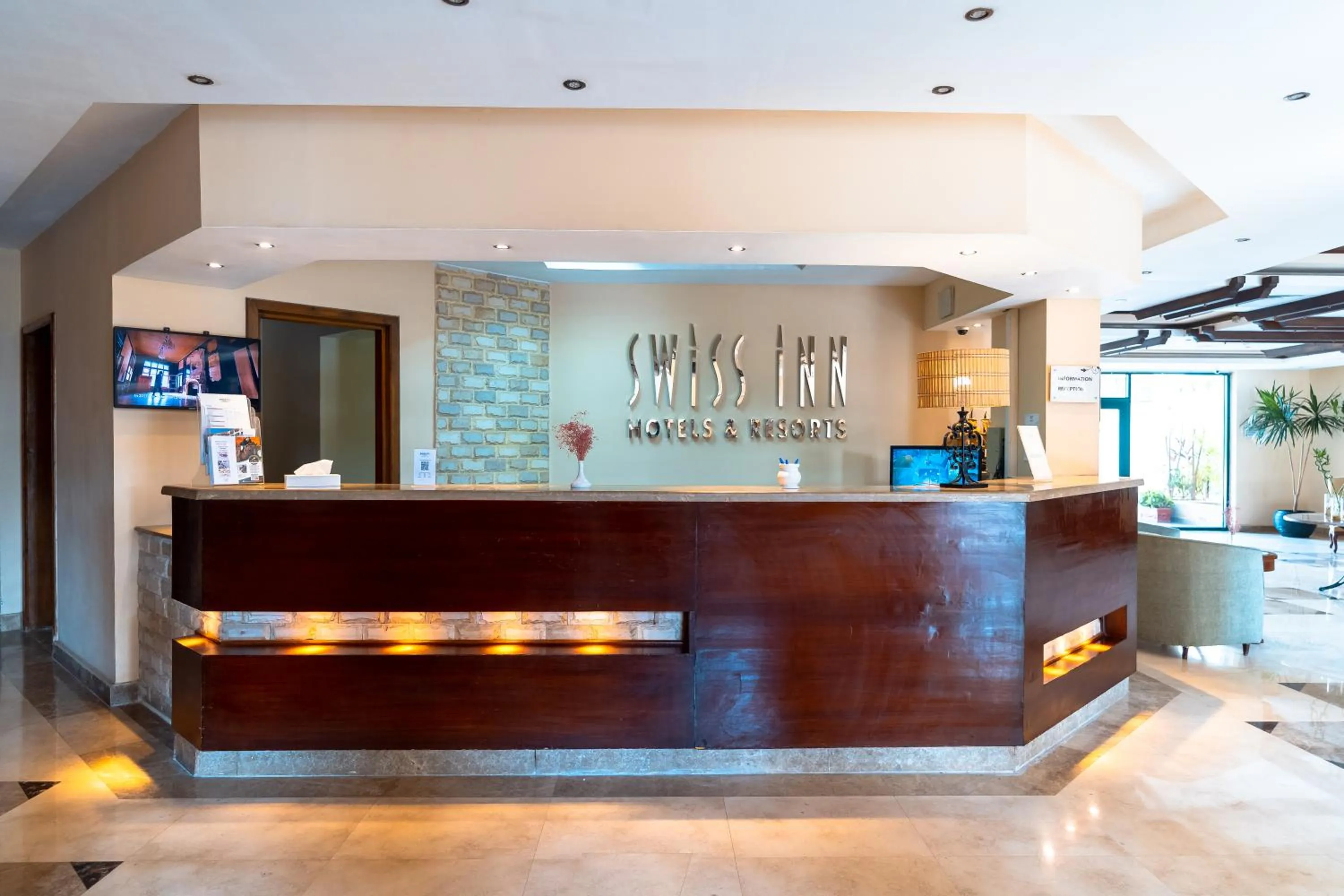 Lobby or reception in Swiss Inn Plaza Hotel