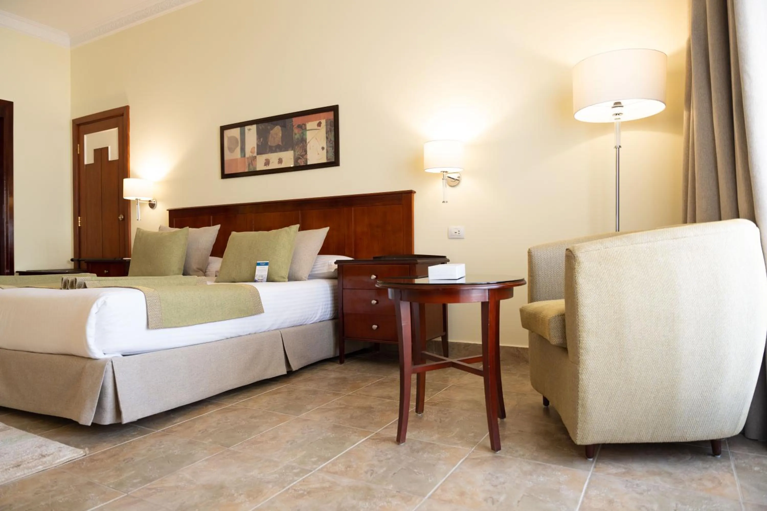 Photo of the whole room, Bed in Swiss Inn Plaza Hotel