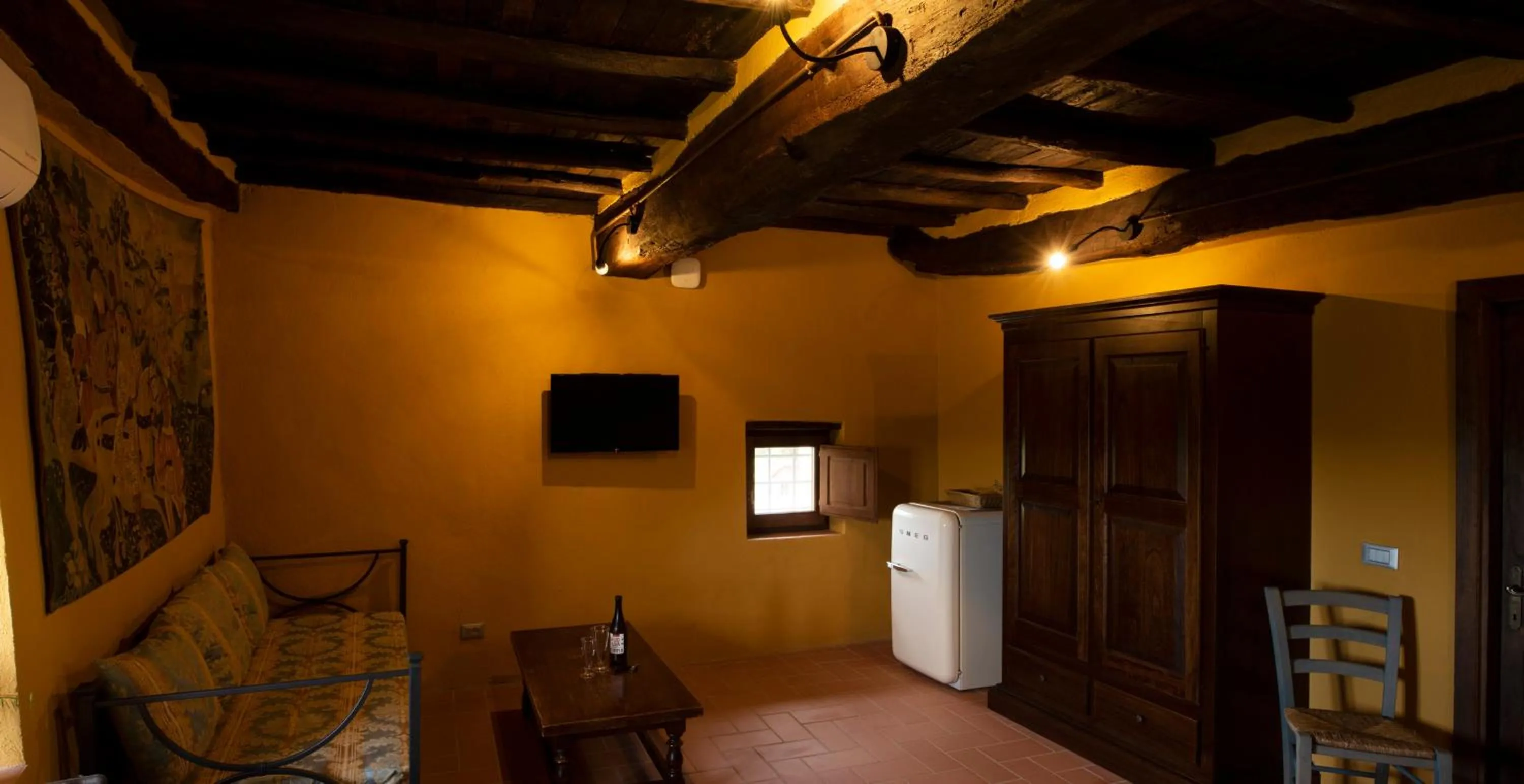 Seating area, Bed in La Rimbecca Greve in Chianti