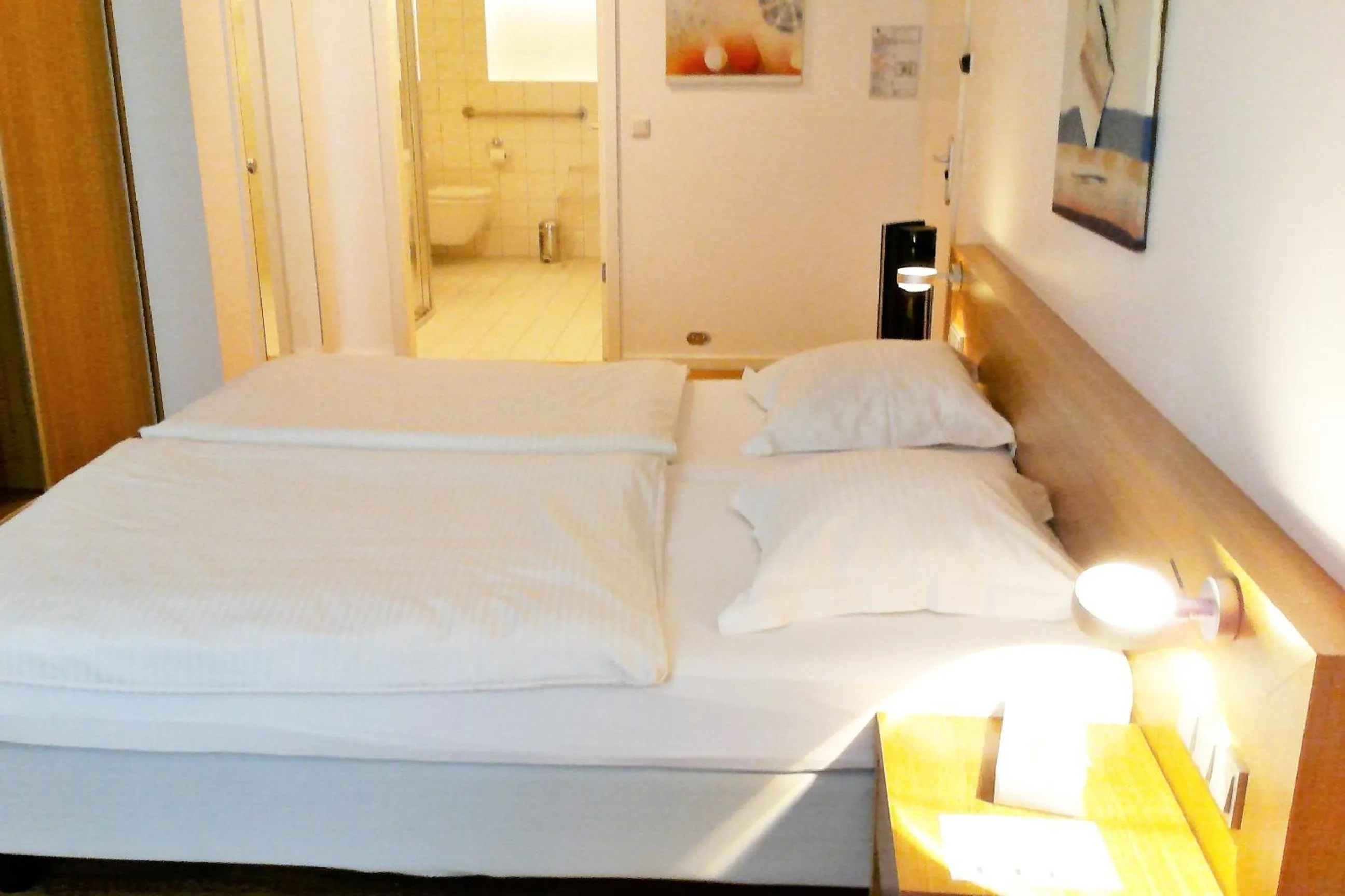 Bed in Hotel Simoncini