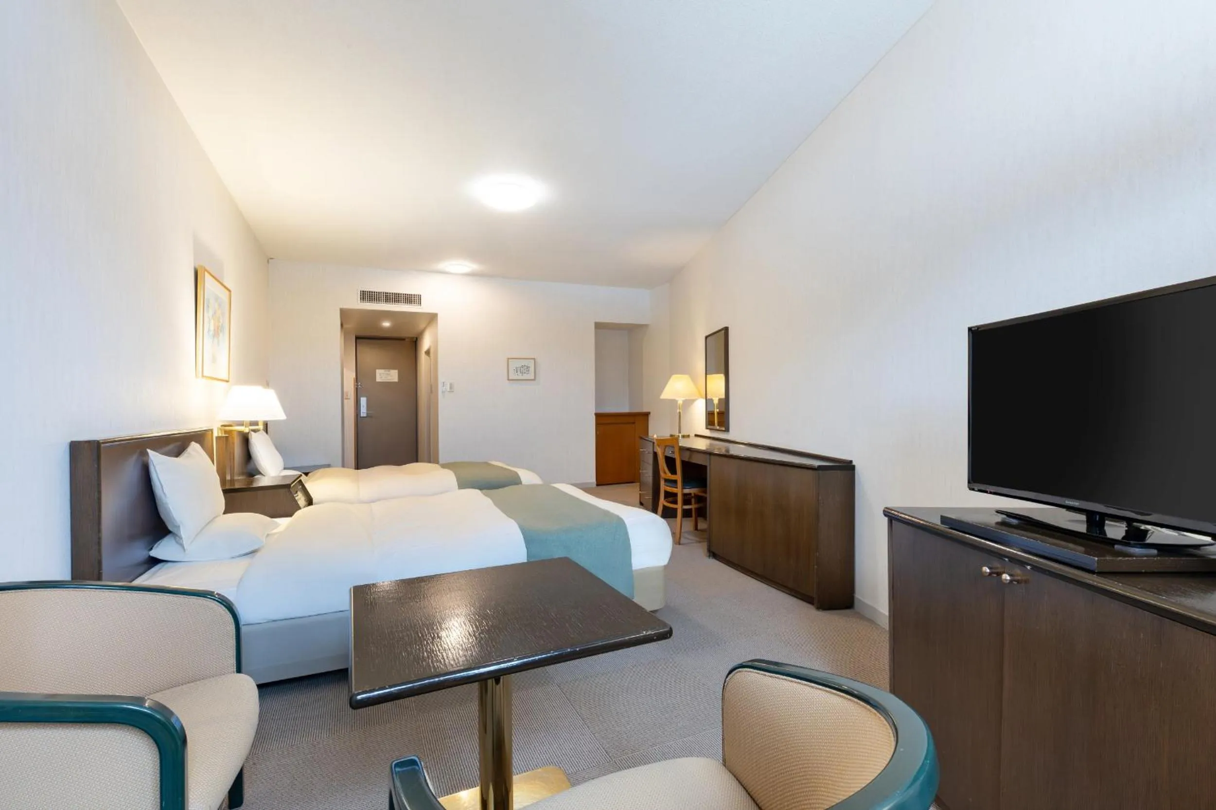 Photo of the whole room, Bed in KAMENOI HOTEL Aomori Makado