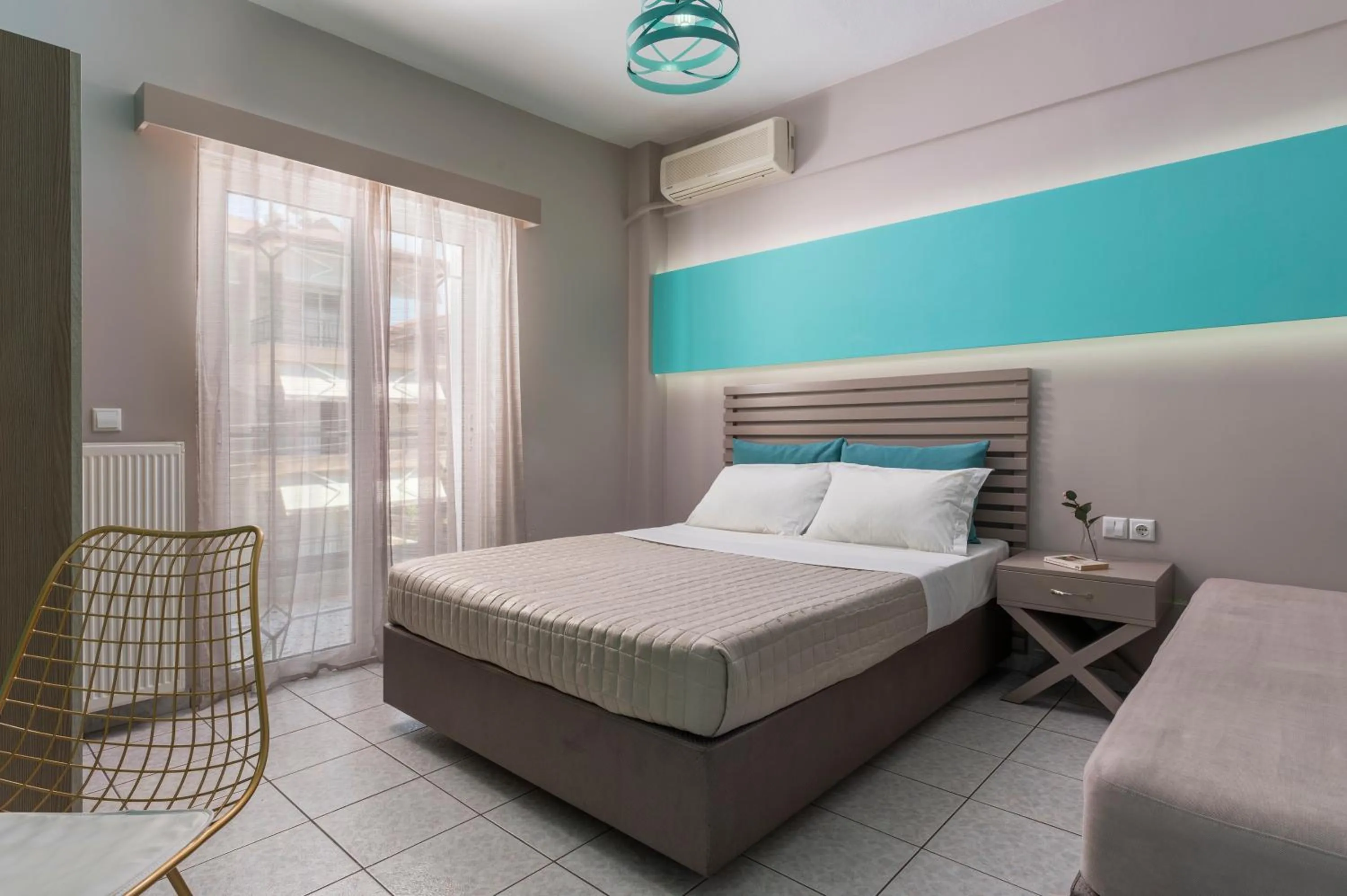 Bed in Ouzas luxury Hotel