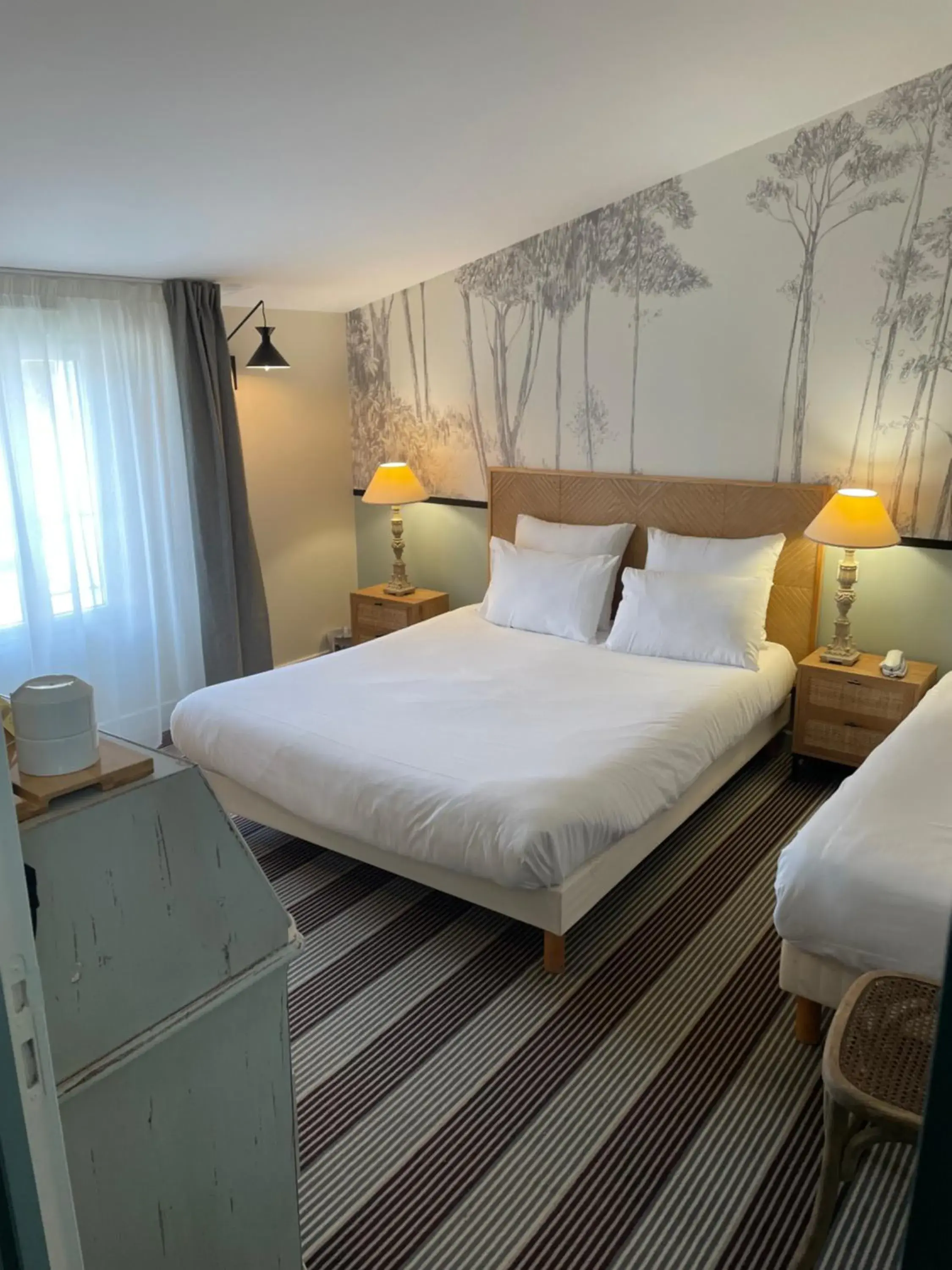 Superior Triple Room in Hôtel Le Martray Superior Triple Room in Hôtel Le Martray