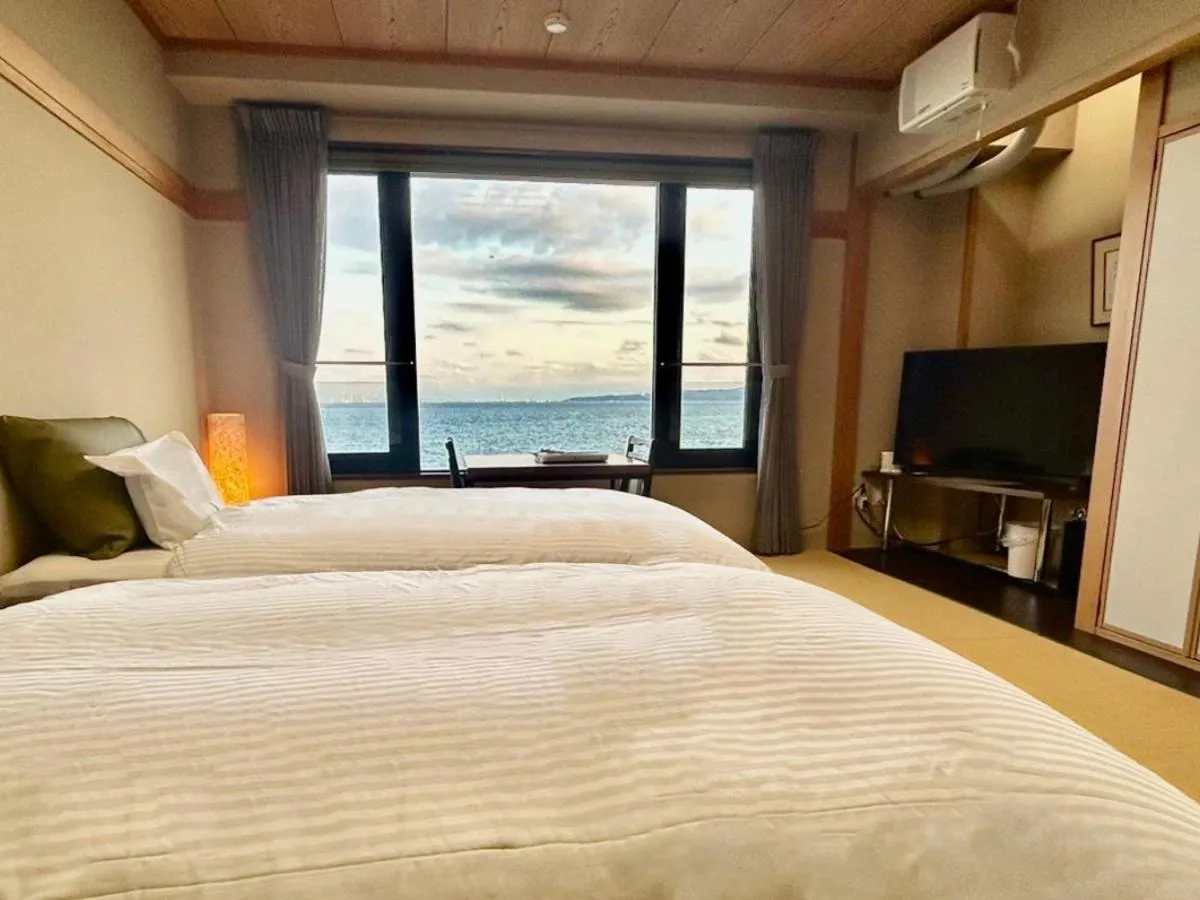 Bed in La se ri Resort and Stay