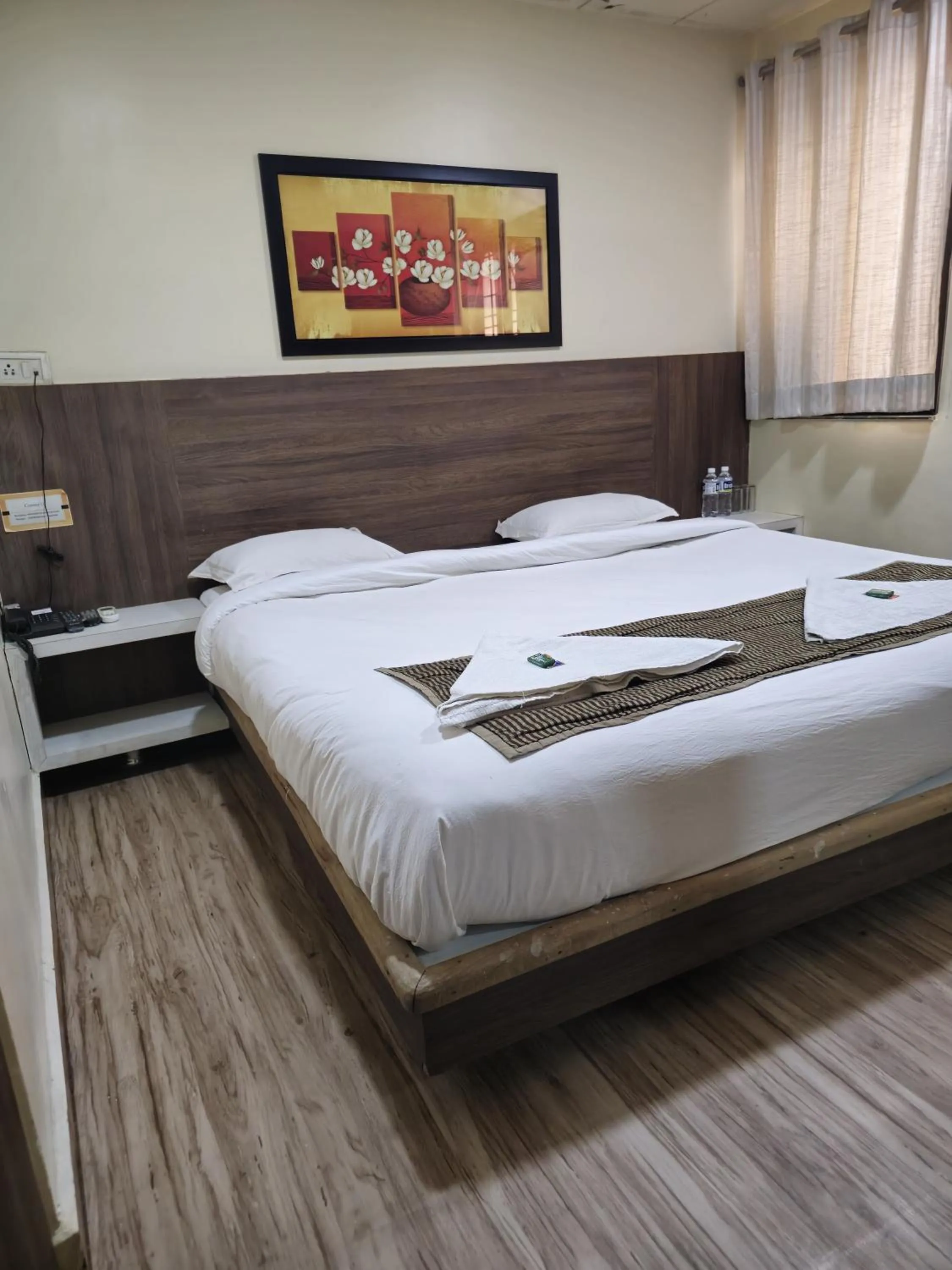 Bed in Hotel Darshan Executive
