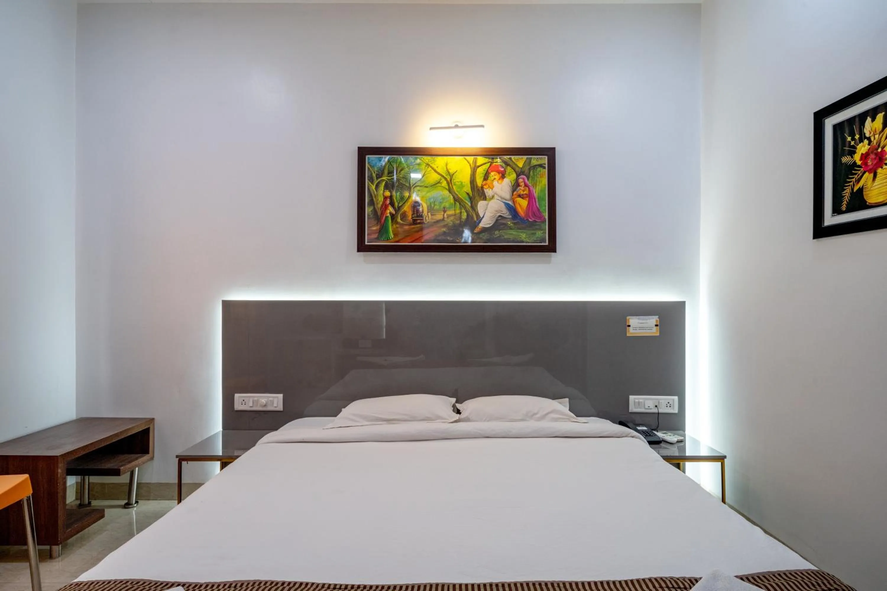 Bed in Hotel Darshan Executive