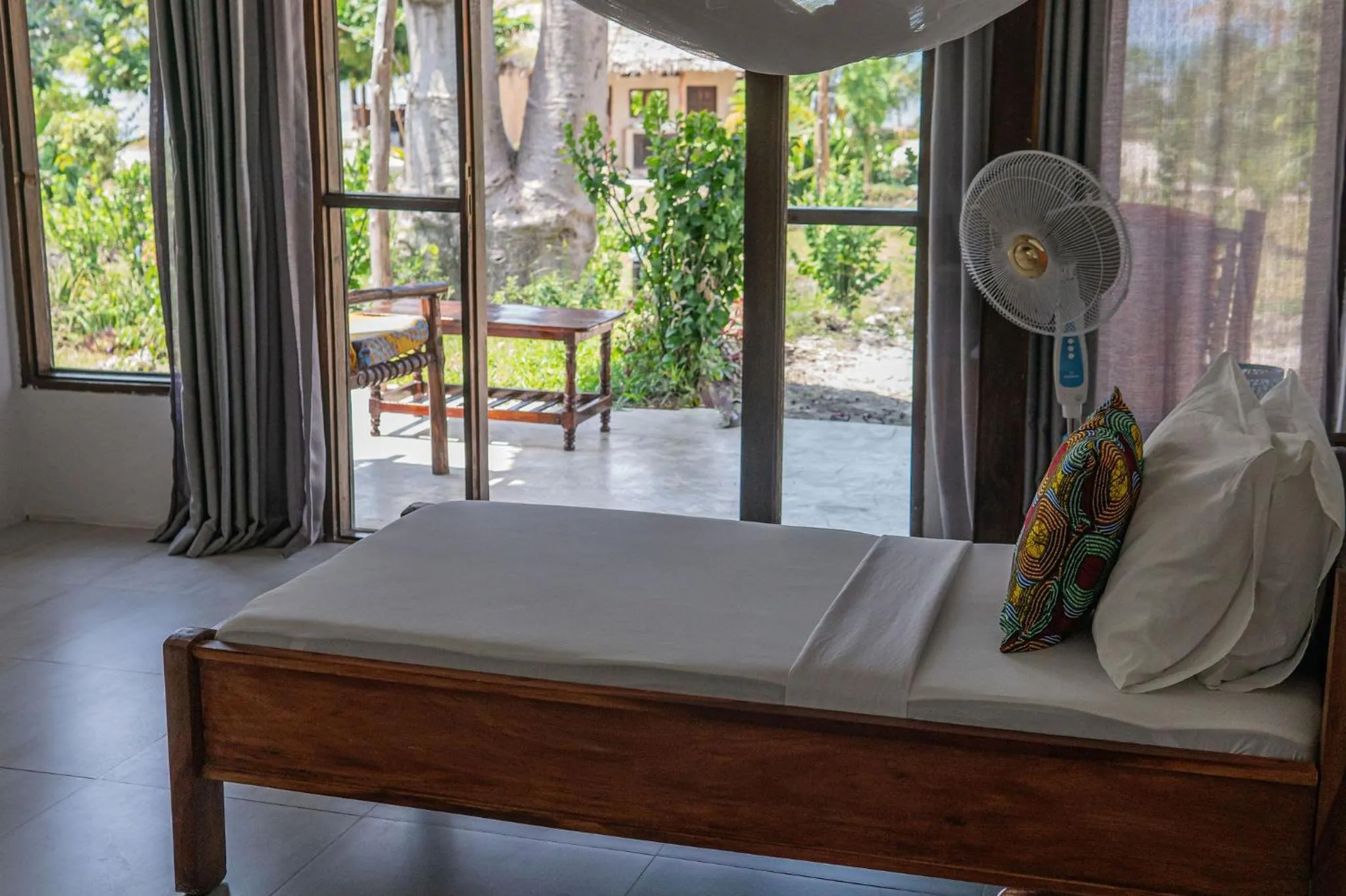 Bed in Jaribu Beach Hotel