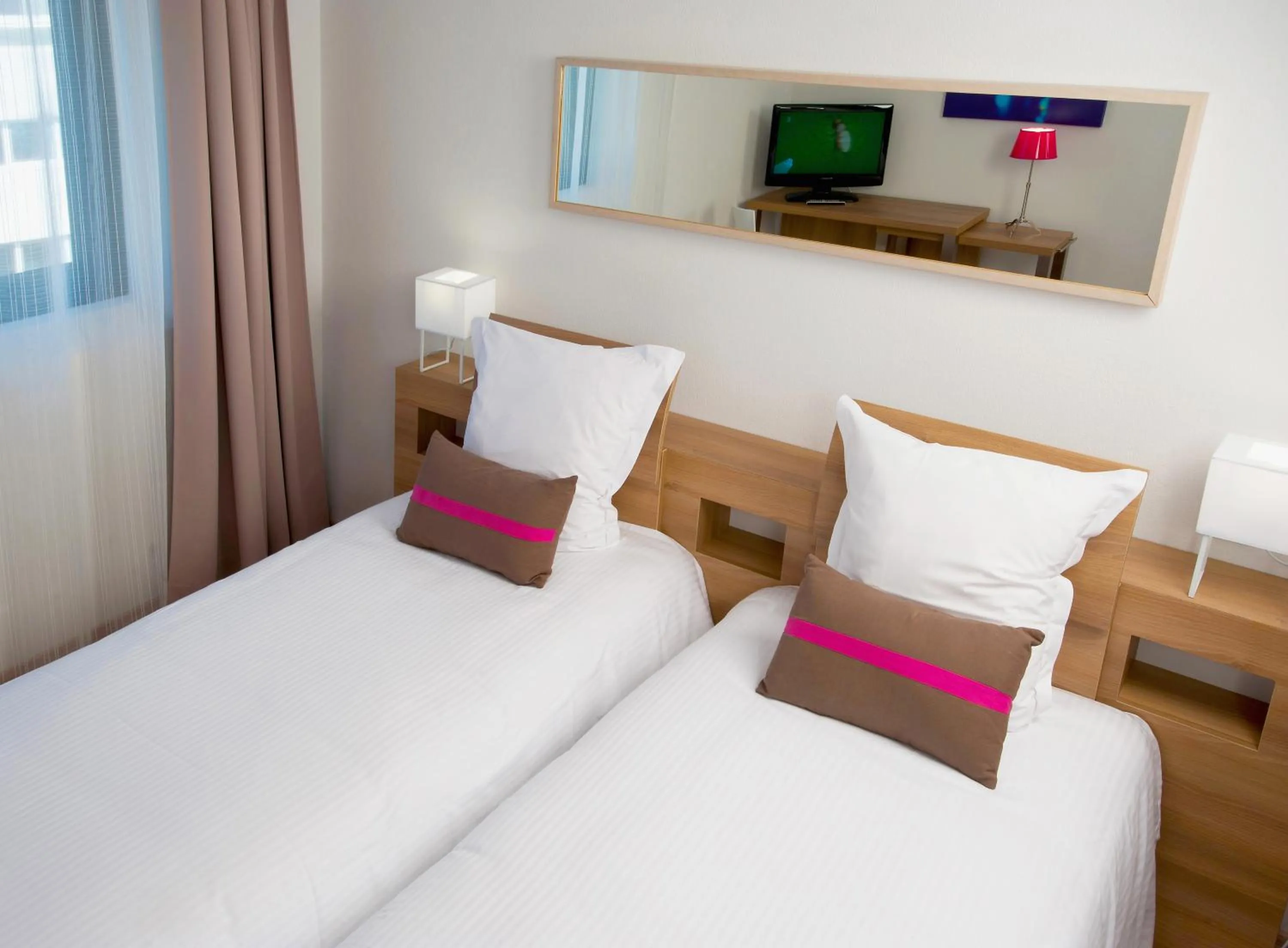 Bed in Ténéo Apparthotel Bordeaux Mérignac - Aéroport