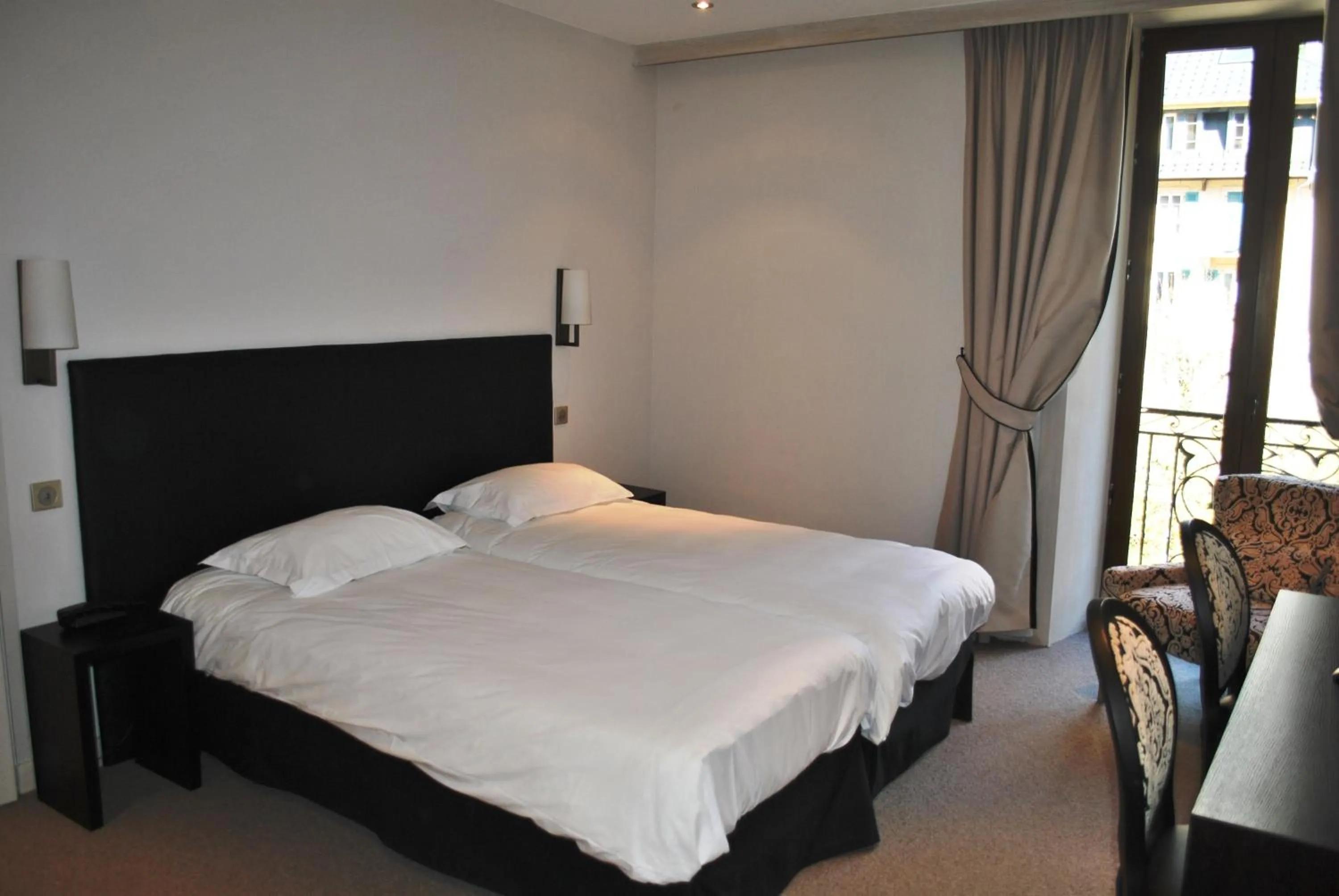 Bedroom in Hôtel Richemond