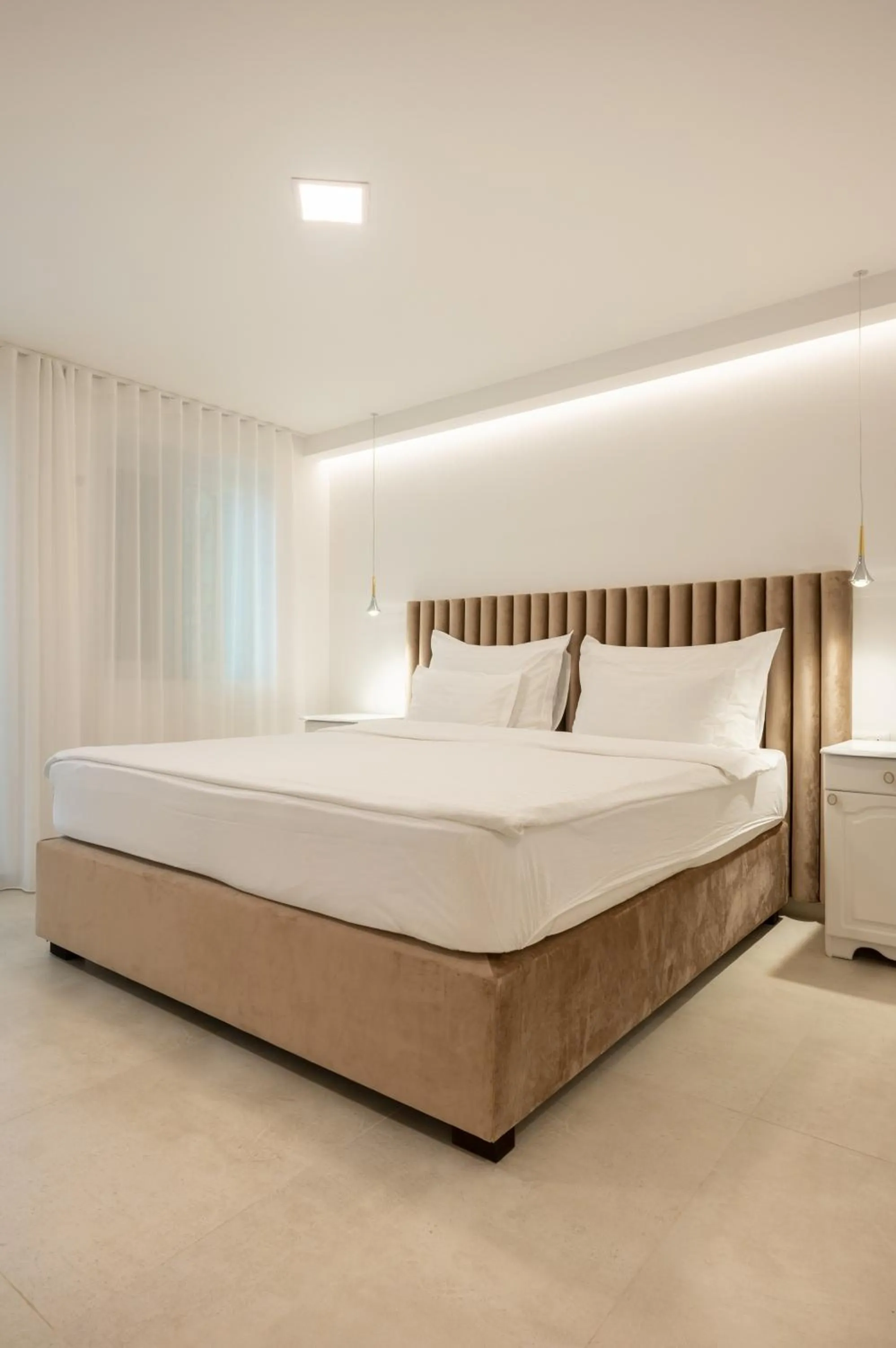 Bed in Nono Ban Boutique Hotel & Villas