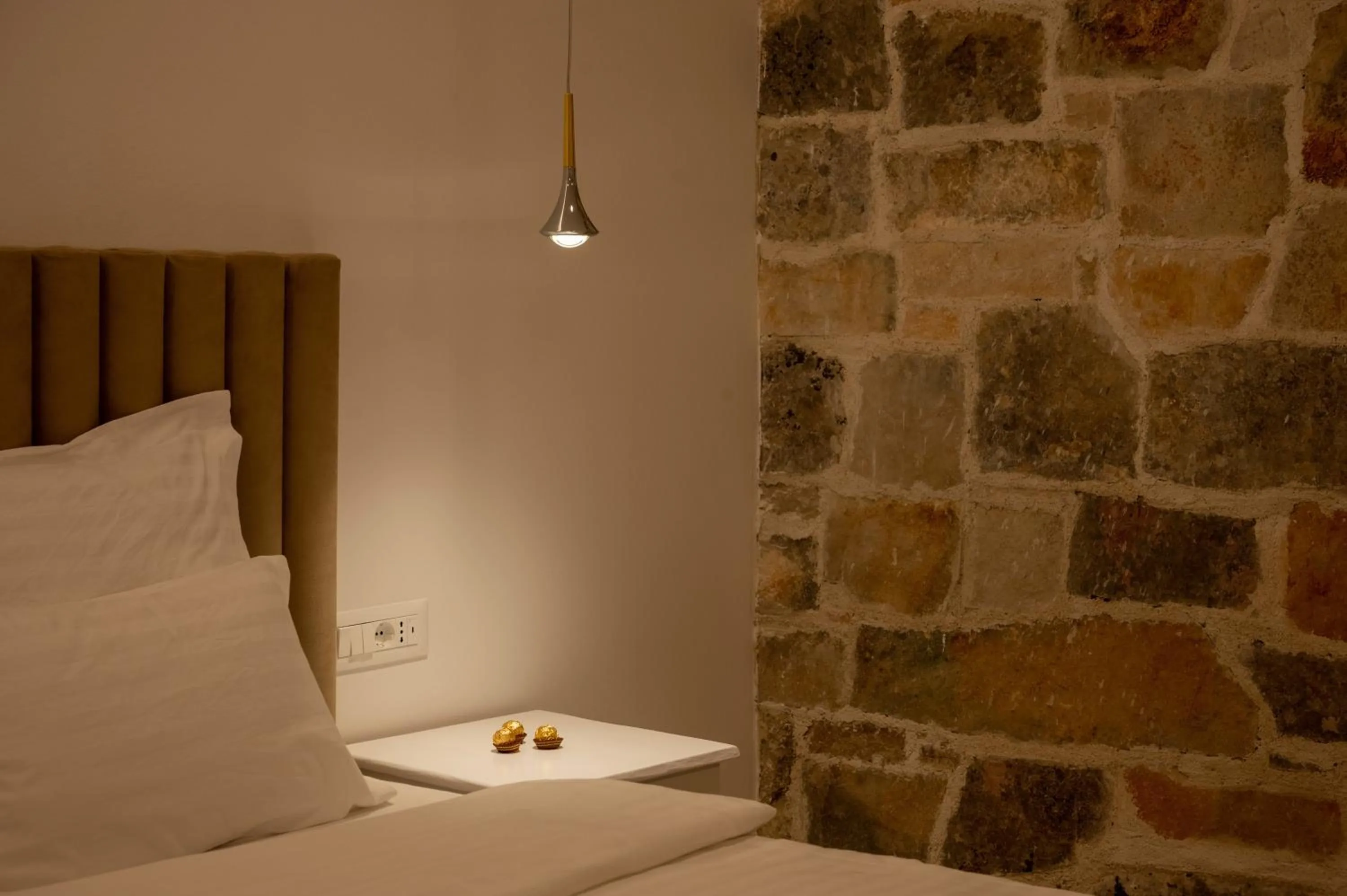 Bed in Nono Ban Boutique Hotel & Villas