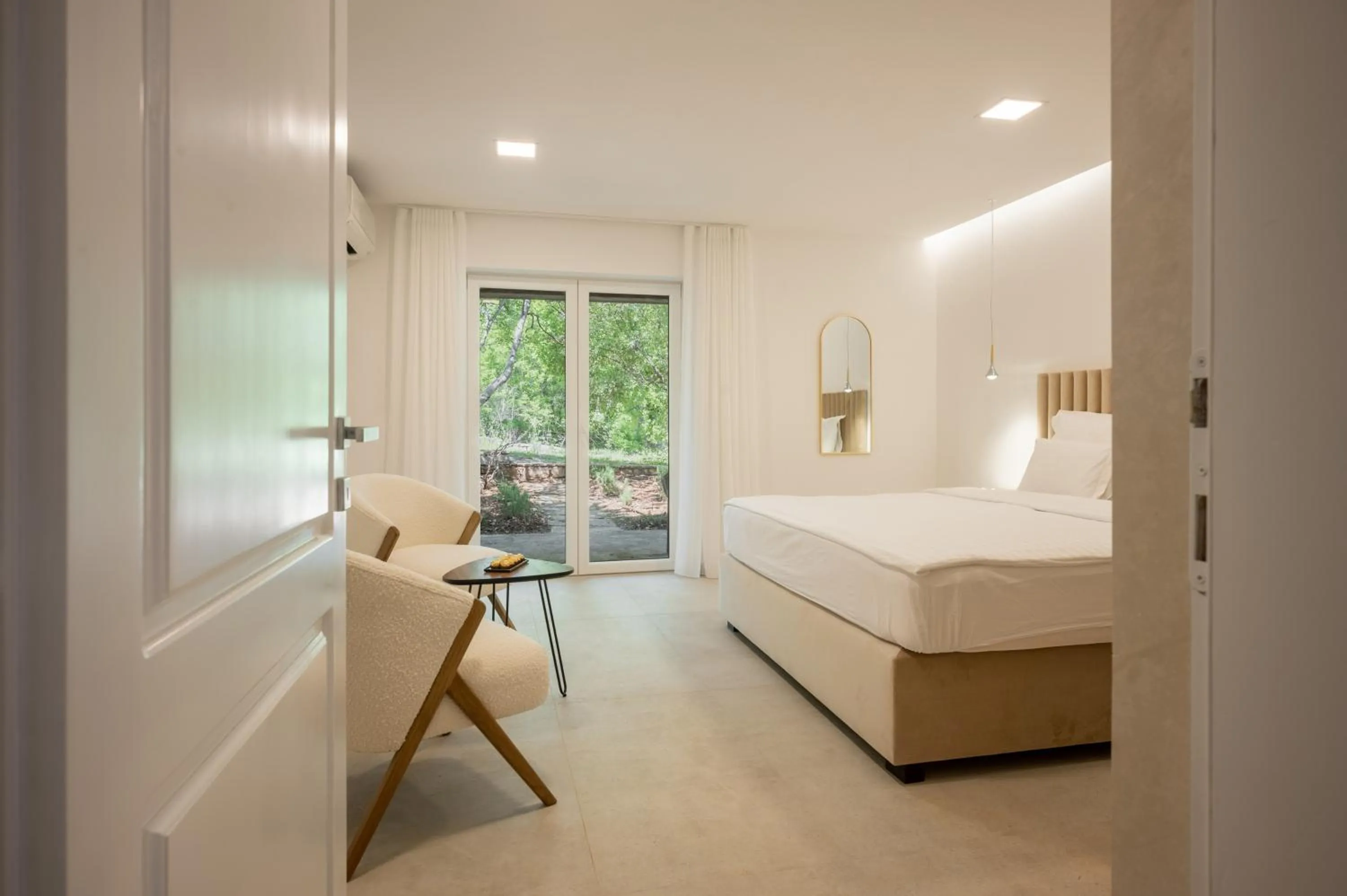 Bed in Nono Ban Boutique Hotel & Villas