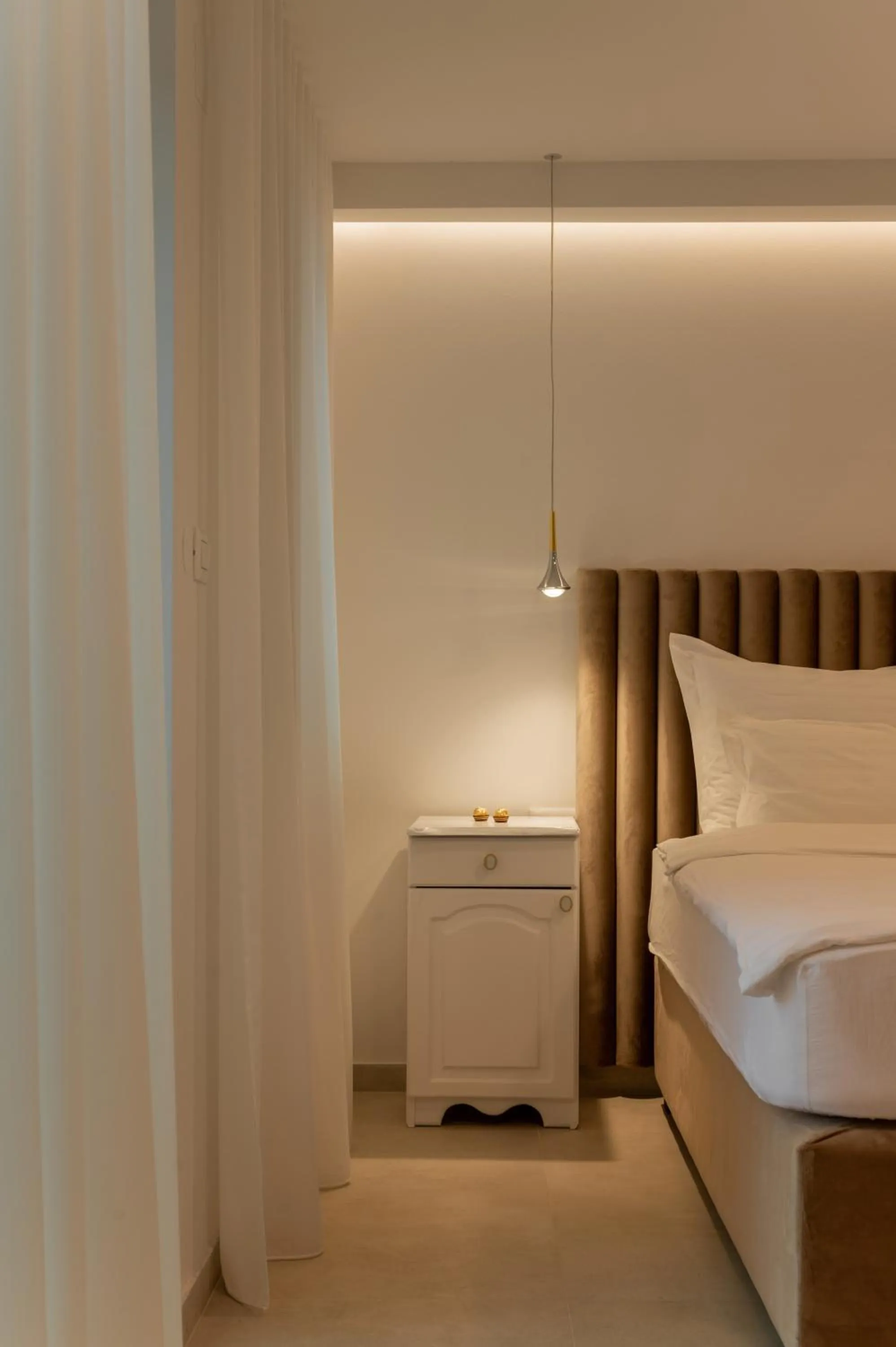 Bed in Nono Ban Boutique Hotel & Villas