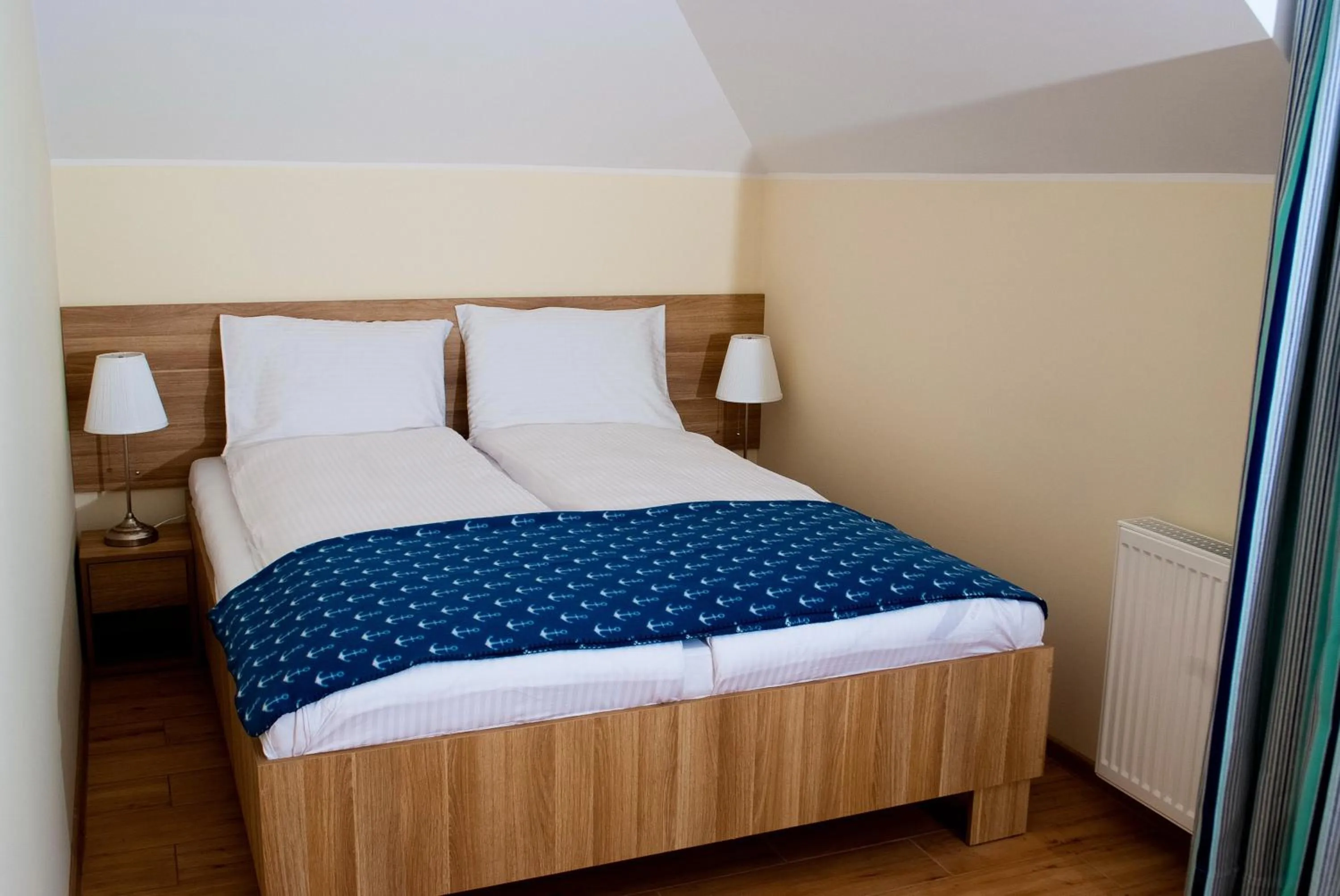 Bed in Apartamenty Kapitanskie