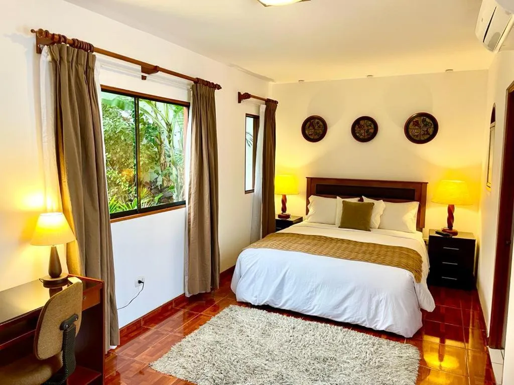 Bed in Casa Bella Boutique Hotel San Isidro