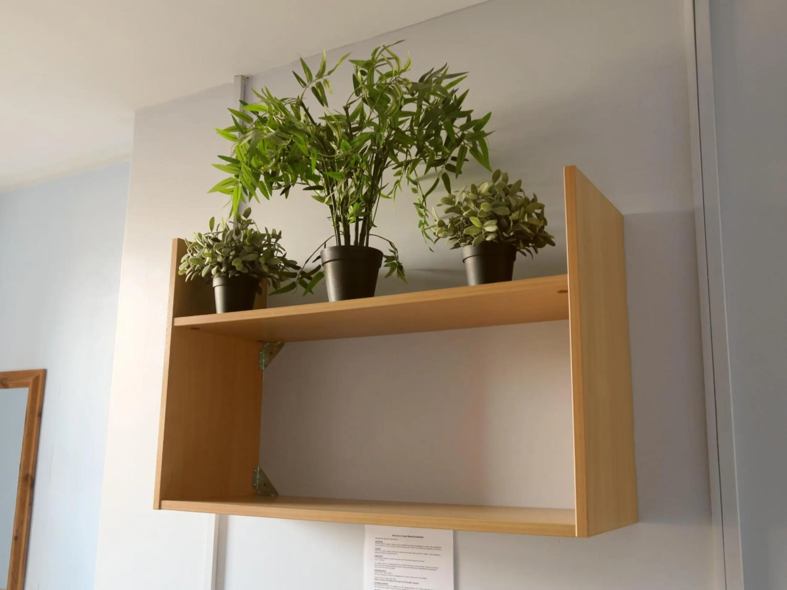 Decorative detail, TV/Entertainment Center in Hotel Strand Continental