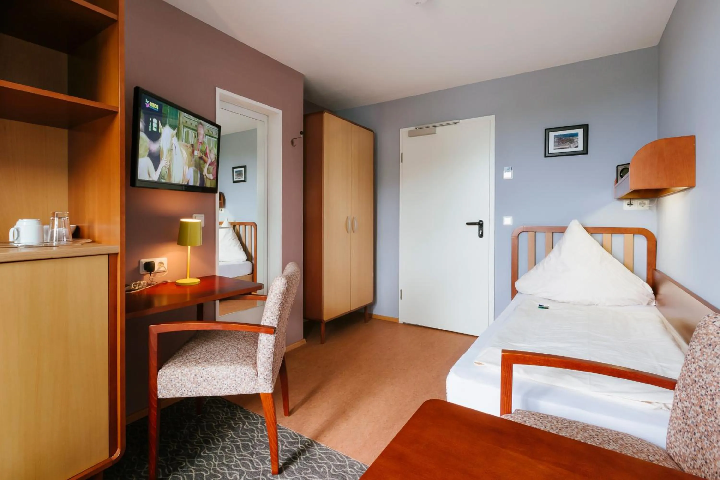 Photo of the whole room, Bed in Hotel Helgoländer Klassik