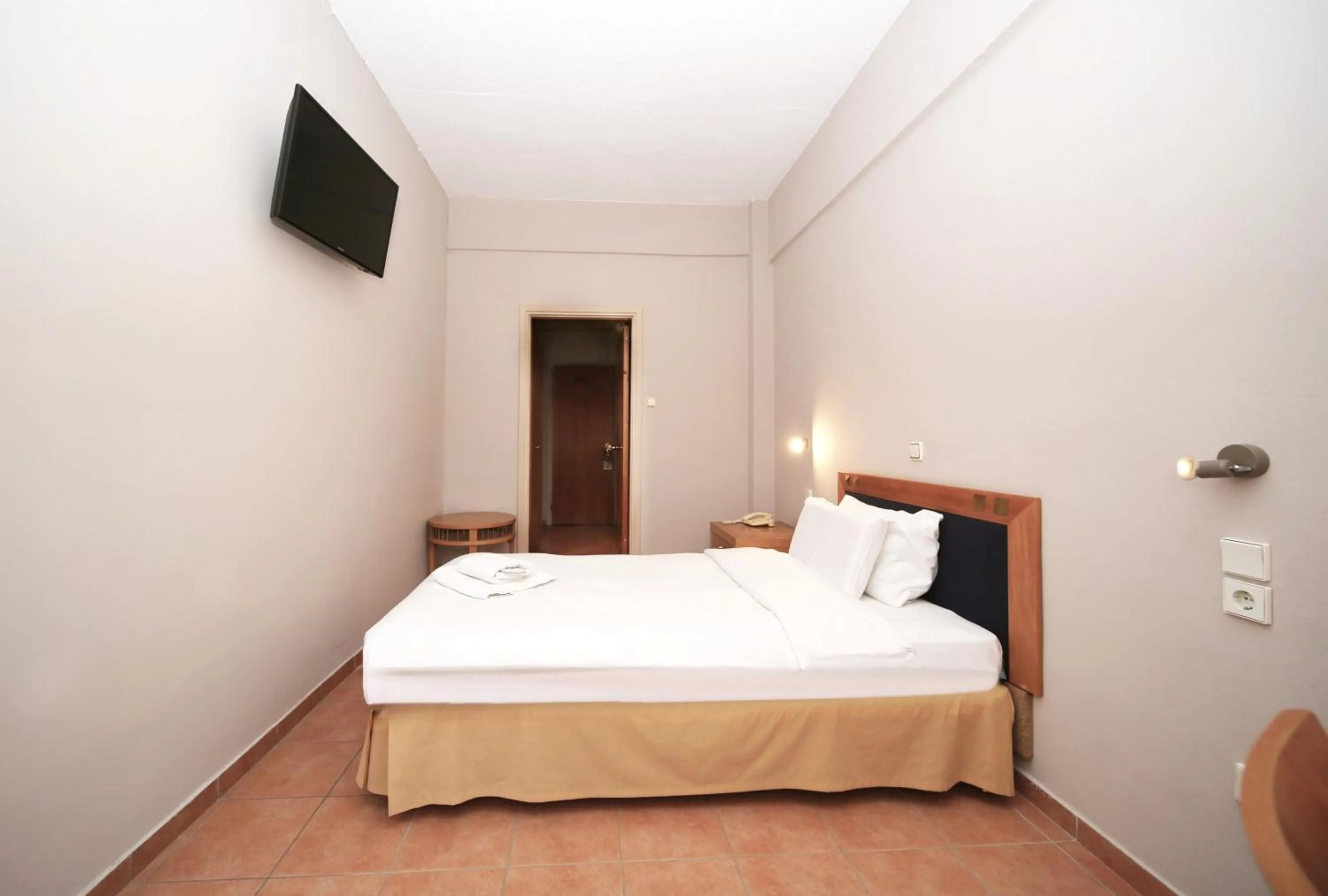 Property building, Bed in Hotel Lecadin