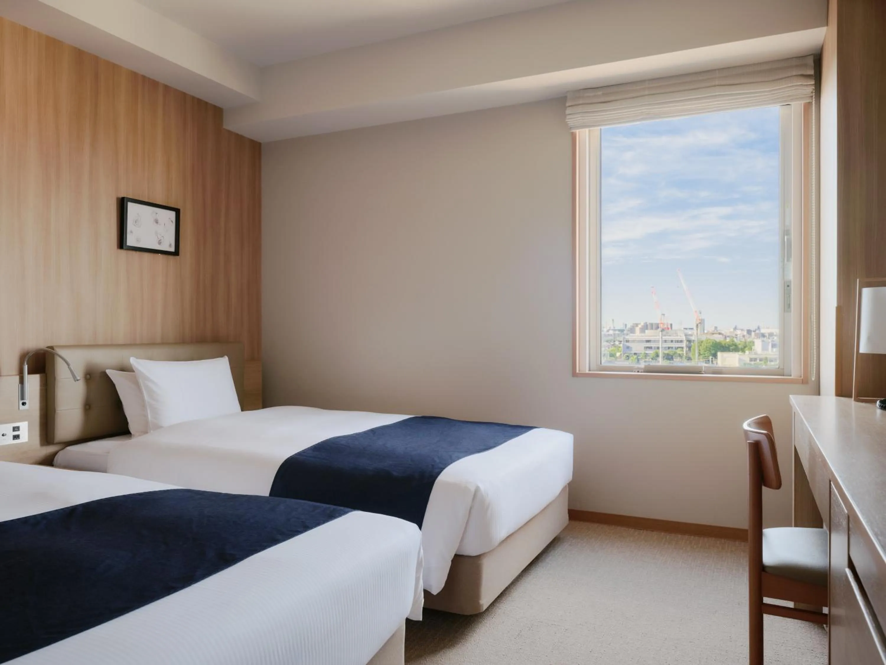 Bed in hotel MONday Haneda Airport