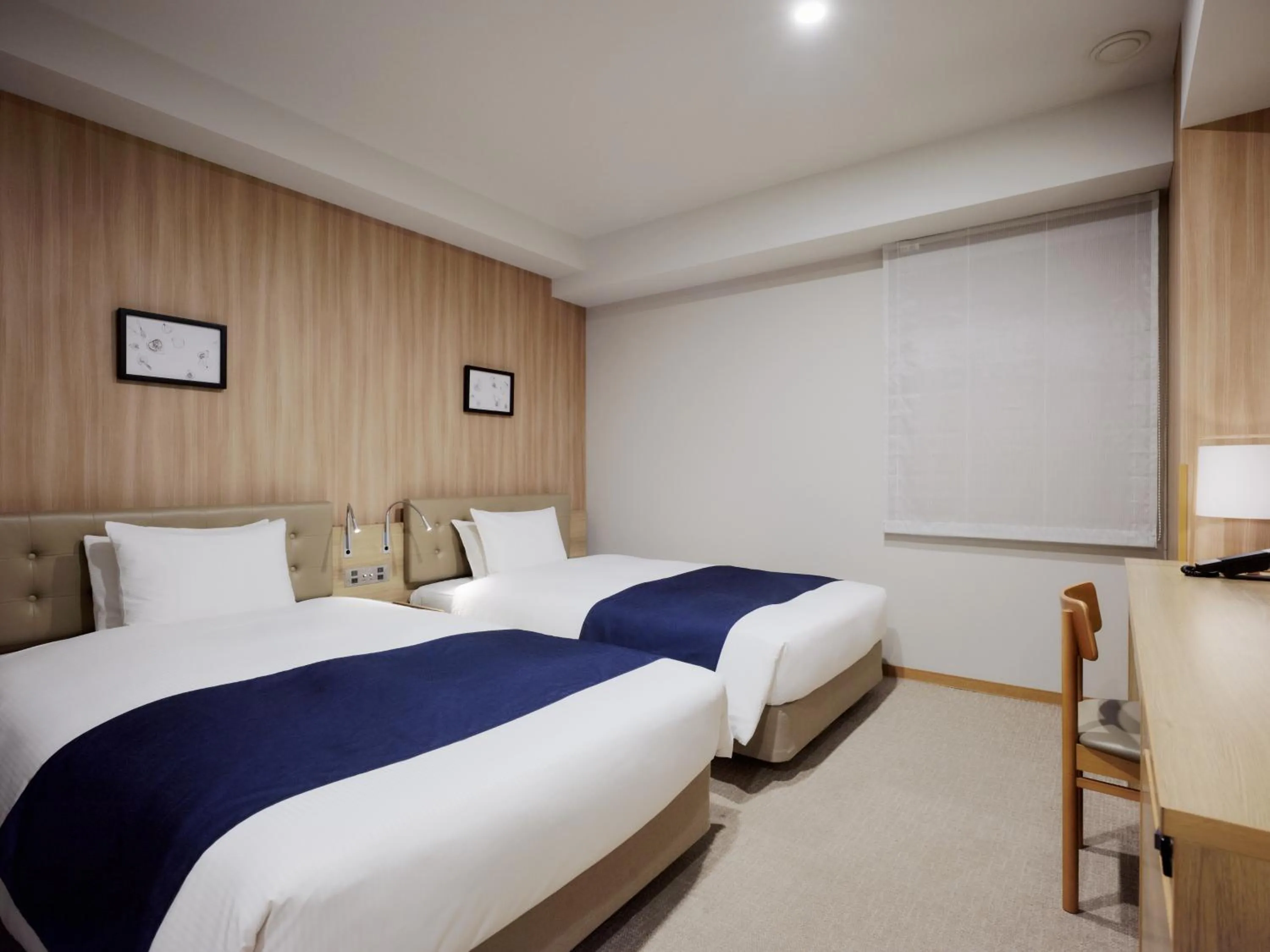 Bed in hotel MONday Haneda Airport