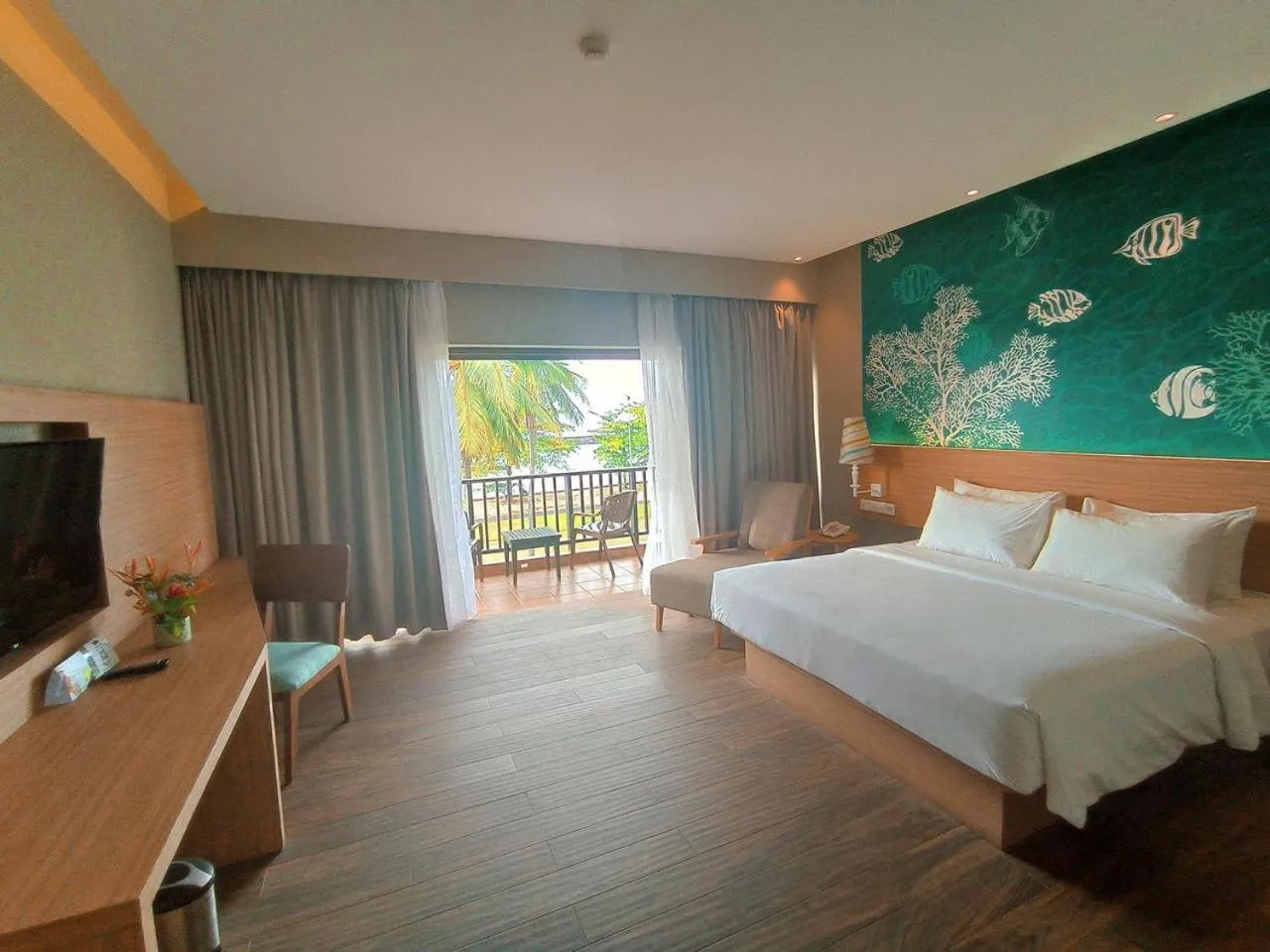 Bed in Manado Tateli Resort and Convention