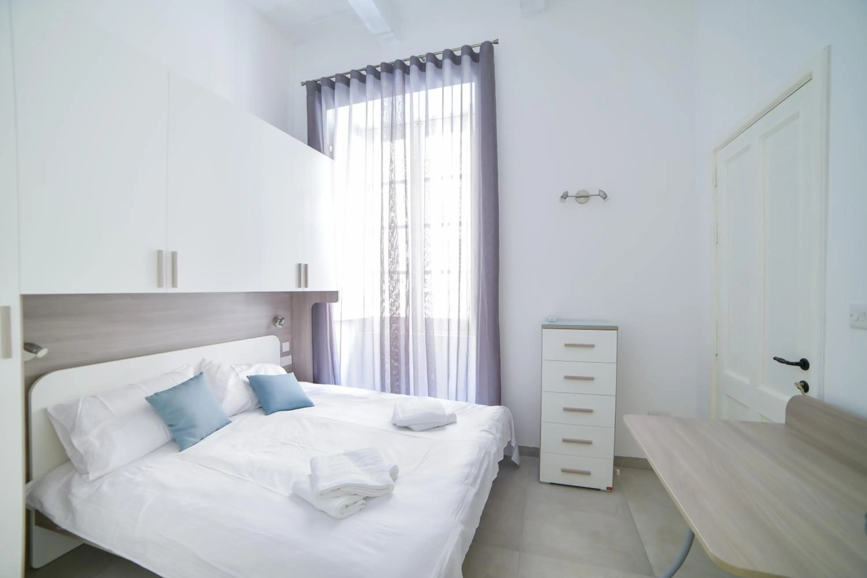 Bed in Vallettastay Classic Apartments