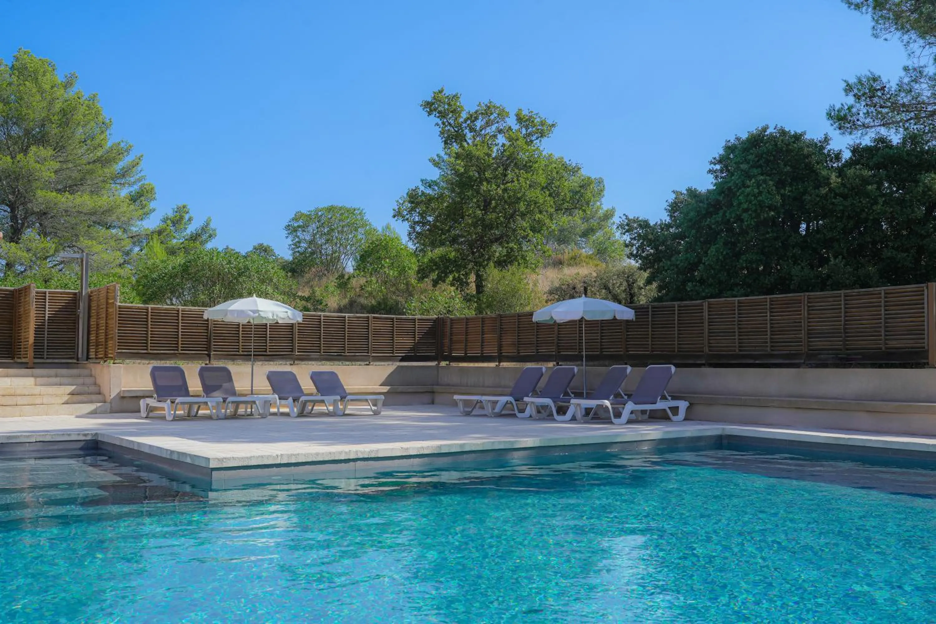 Swimming pool in Grand Prix Hôtel & Restaurant