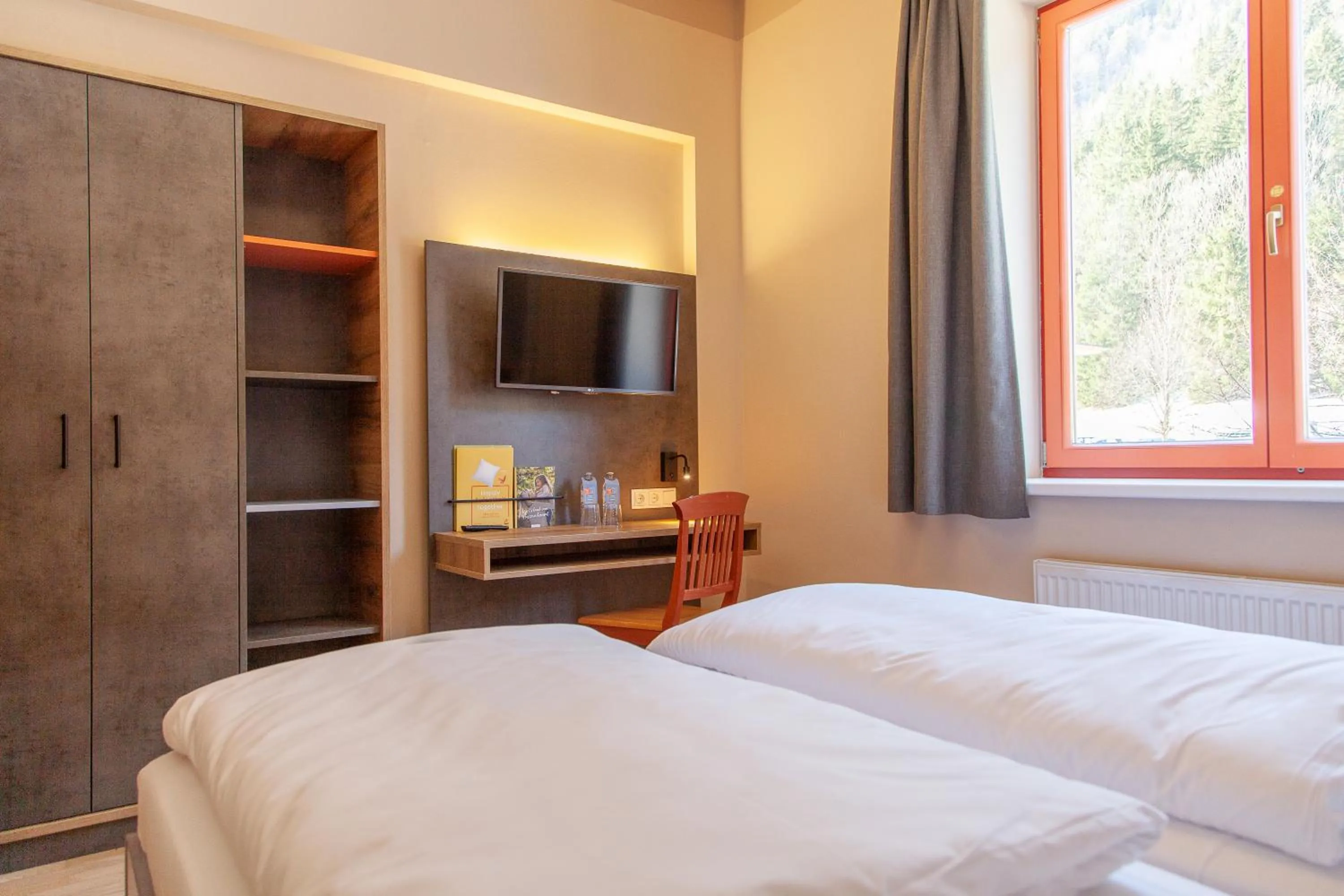 Photo of the whole room, Bed in JUFA Hotel Mariazell