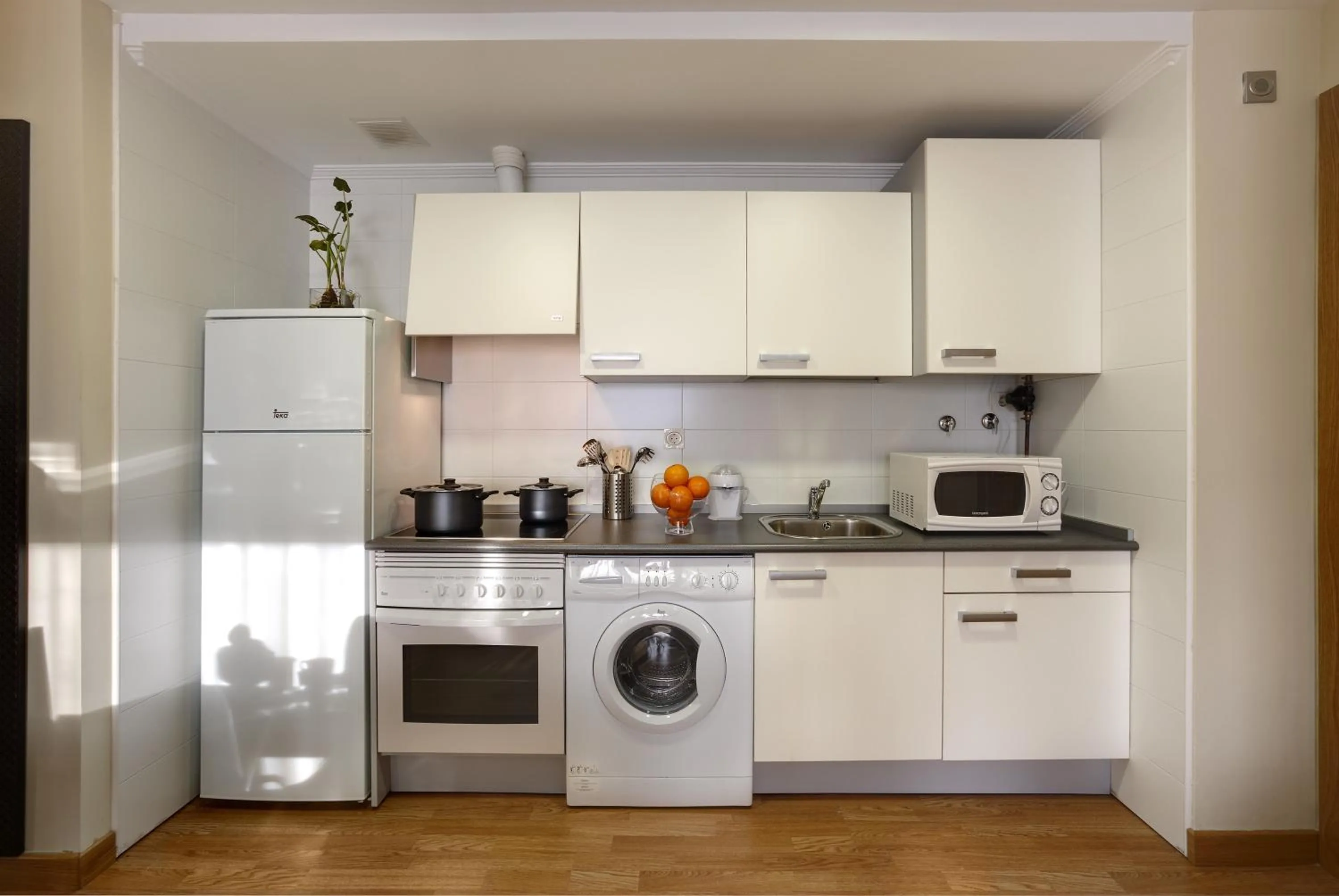 Kitchen or kitchenette in Spirit Apartamentos Atxuri