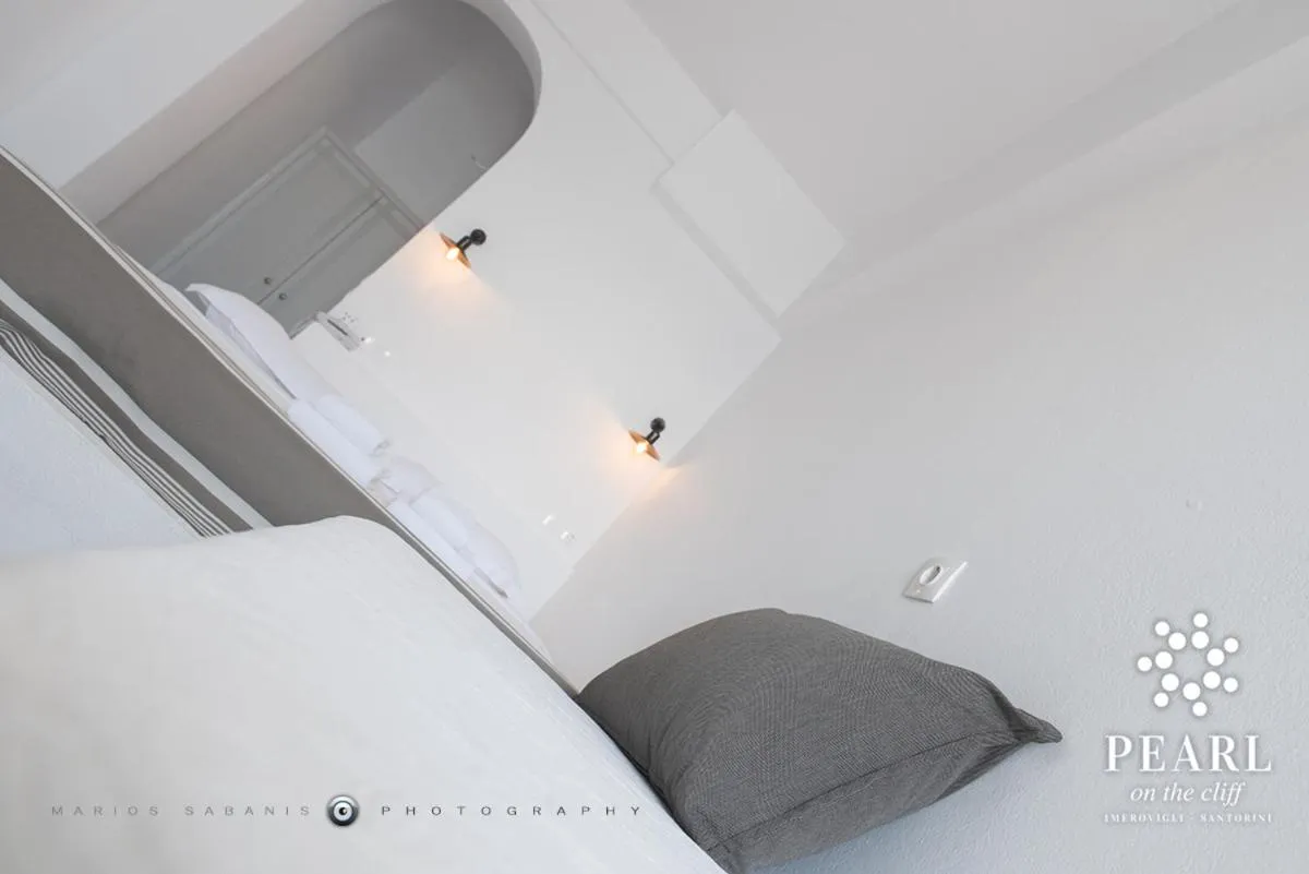 Bed in Pearl on the Cliff Hotel & Suites by Pearl Hotel Collection