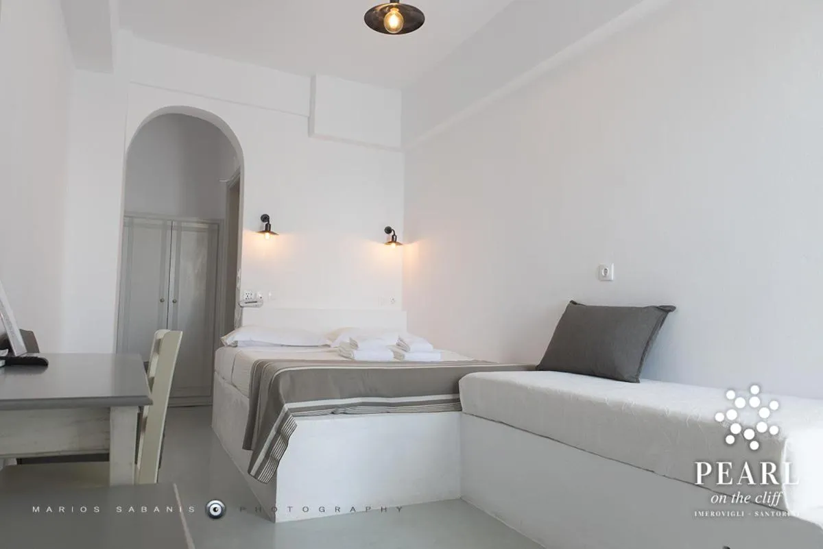 Bed in Pearl on the Cliff Hotel & Suites by Pearl Hotel Collection