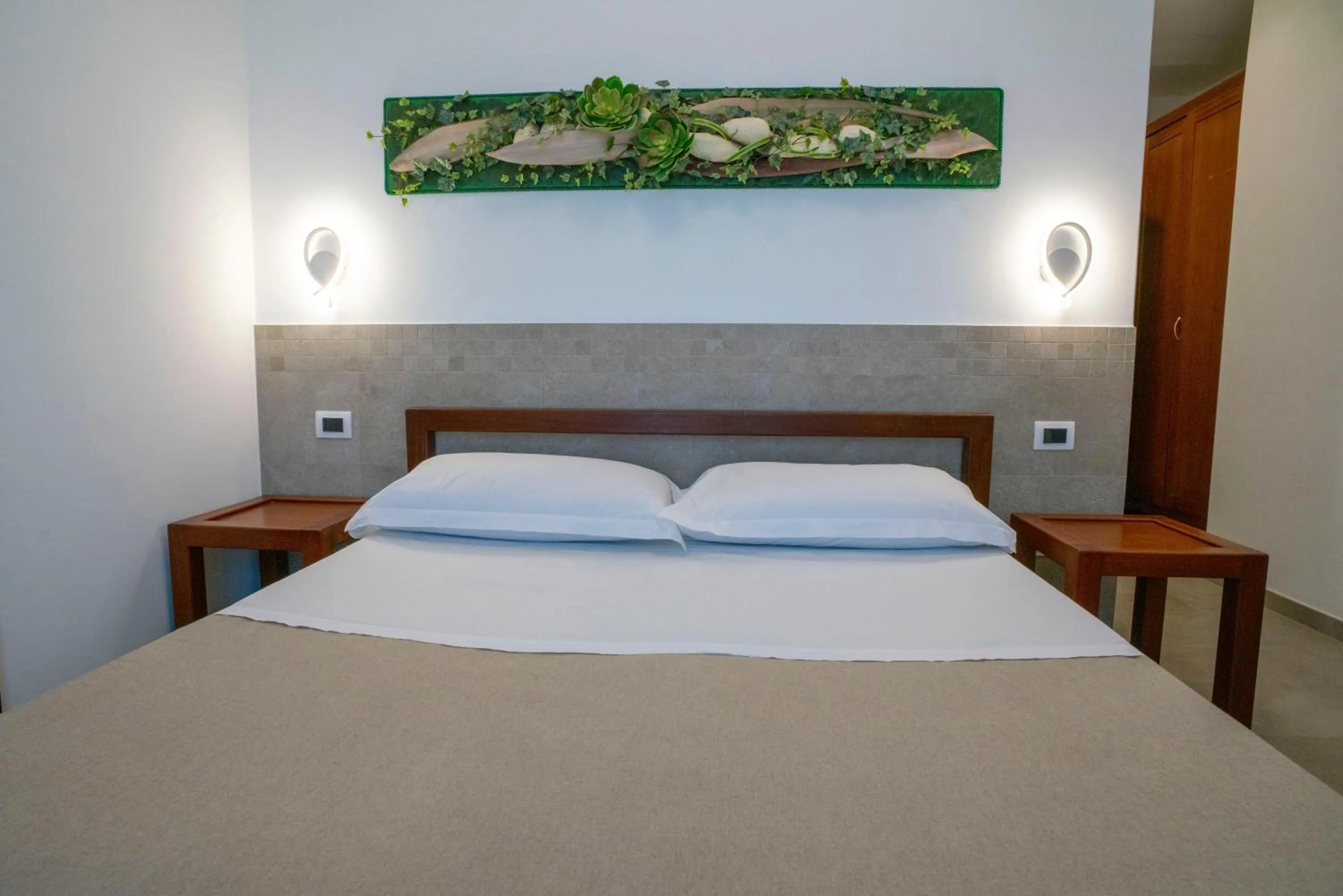 View (from property/room), Bed in Petit Hotel