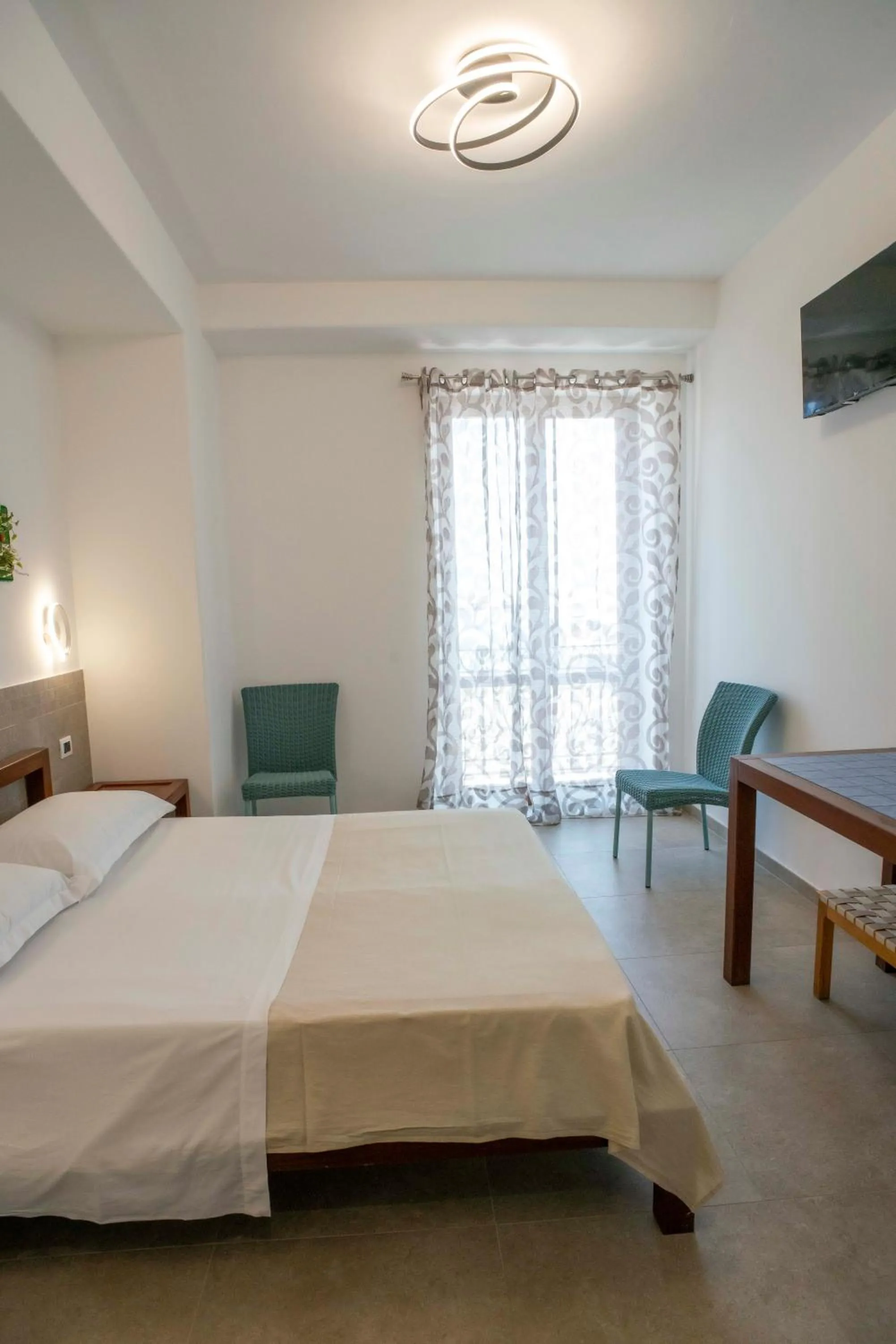 View (from property/room), Bed in Petit Hotel