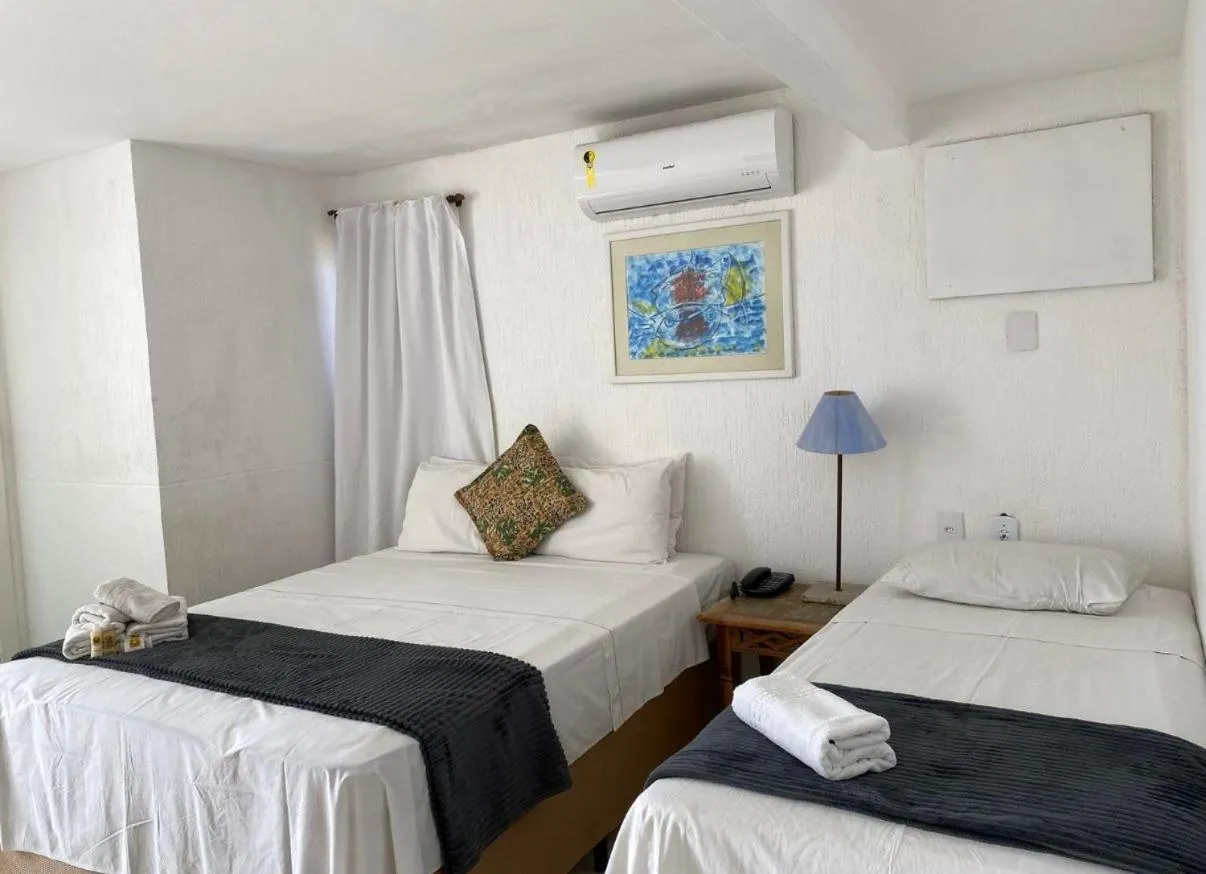 Bed in Hotel Pousada Casacolina